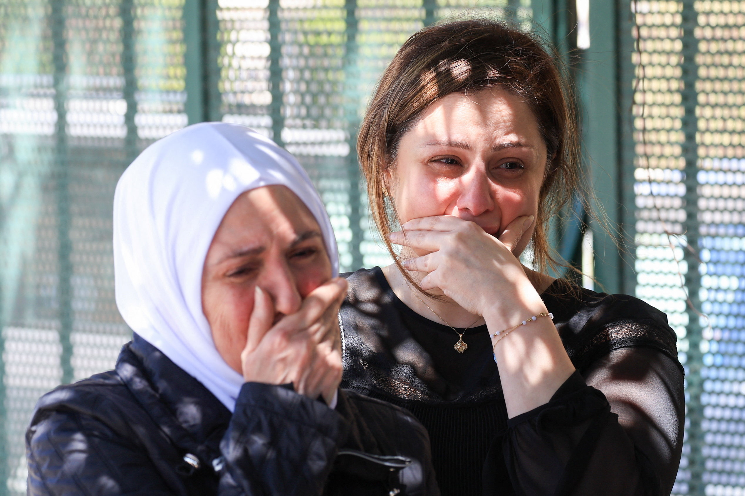 Mother and wife of Lebanese man Mohammed Zain Al-Abidin Shehab, who was killed in an Israeli strike on Wednesday, react during his funeral in Beirut, Lebanon, April 9, 2026. REUTERS/Mohamad Azakir