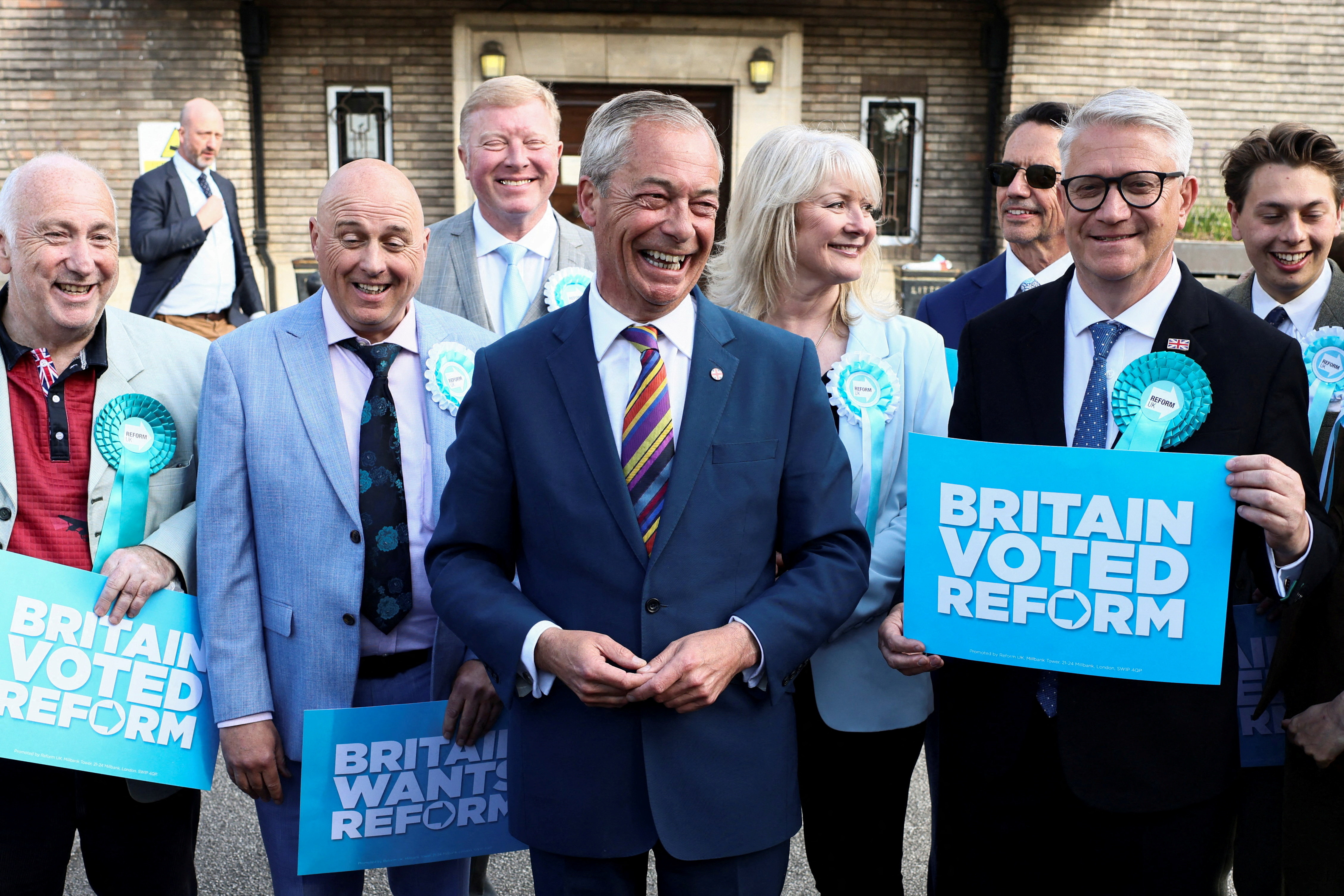 Farage appears with newly elected councillors and MP Andrew Rosindell after local elections in the London Borough of Havering on May 8, 2026