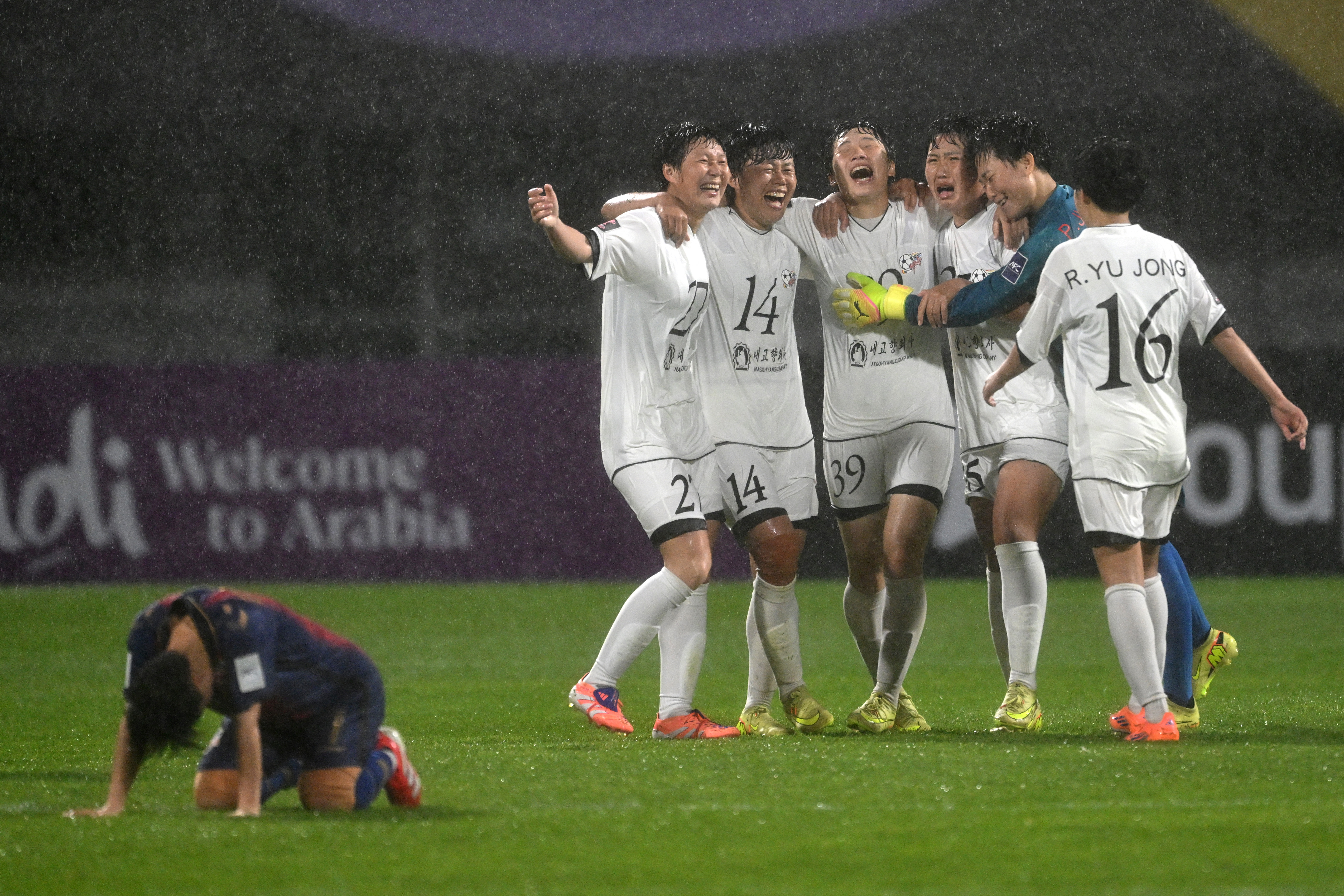 Naegohyang Women's FC players celebrate their victory after the AFC Women's Champions League semi-final football match between North Korea's Naegohyang Women's FC and South Korea's Suwon FC Women in Suwon on May 20, 2026. (Photo by Jung Yeon-je / AFP)