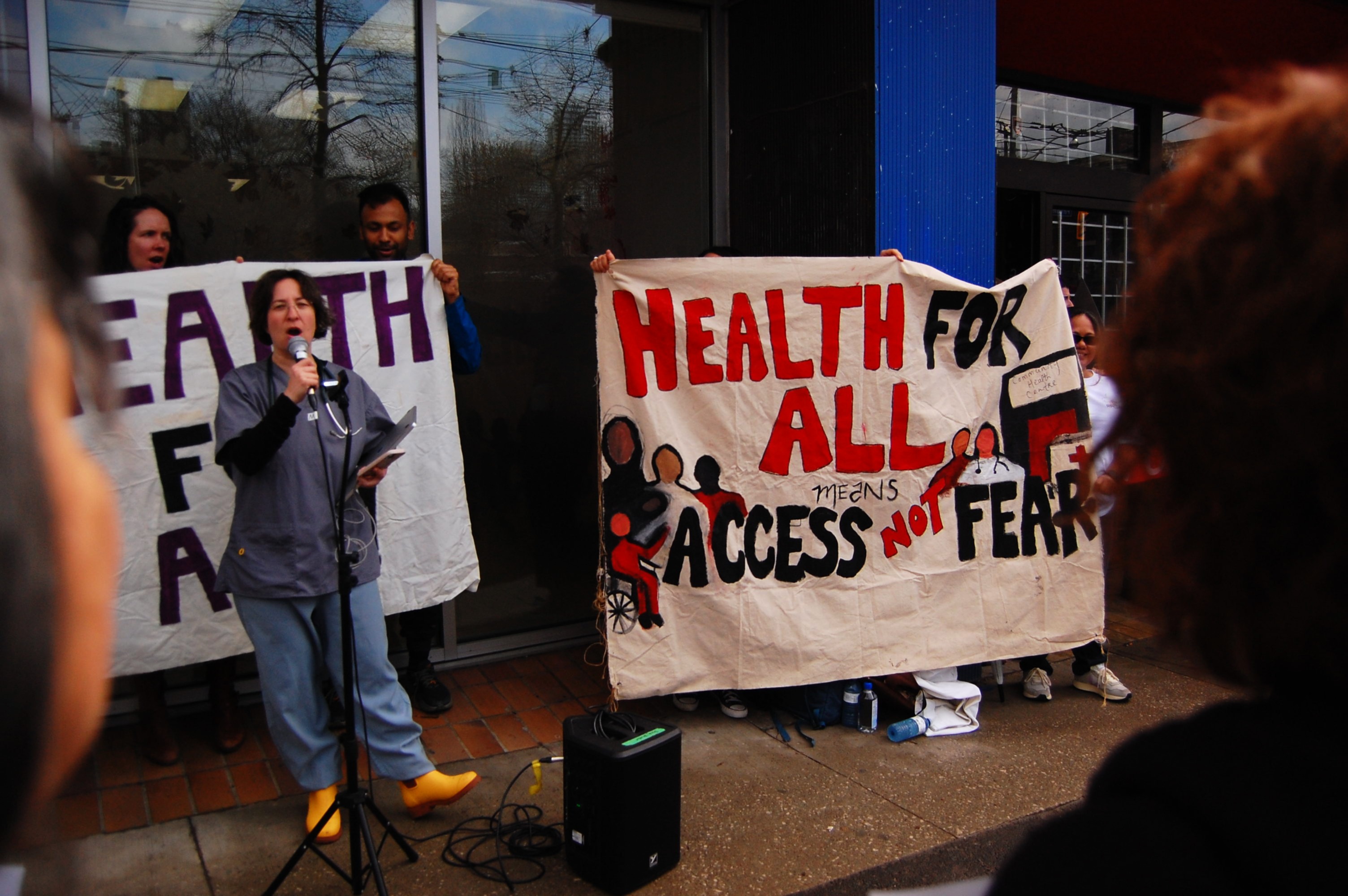 Healthcare workers protest against cuts to a refugee health programme in Toronto, Canada, in April 2026