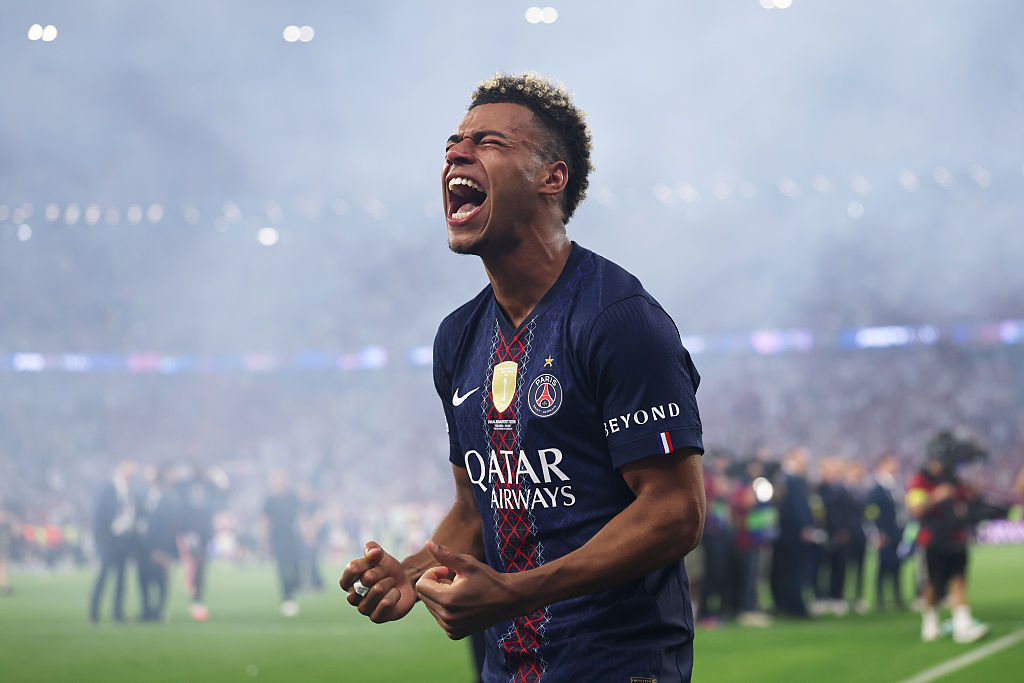 Desire Doue of Paris Saint-Germain celebrates after defeating Arsenal in the penalty shootout during the UEFA Champions League final