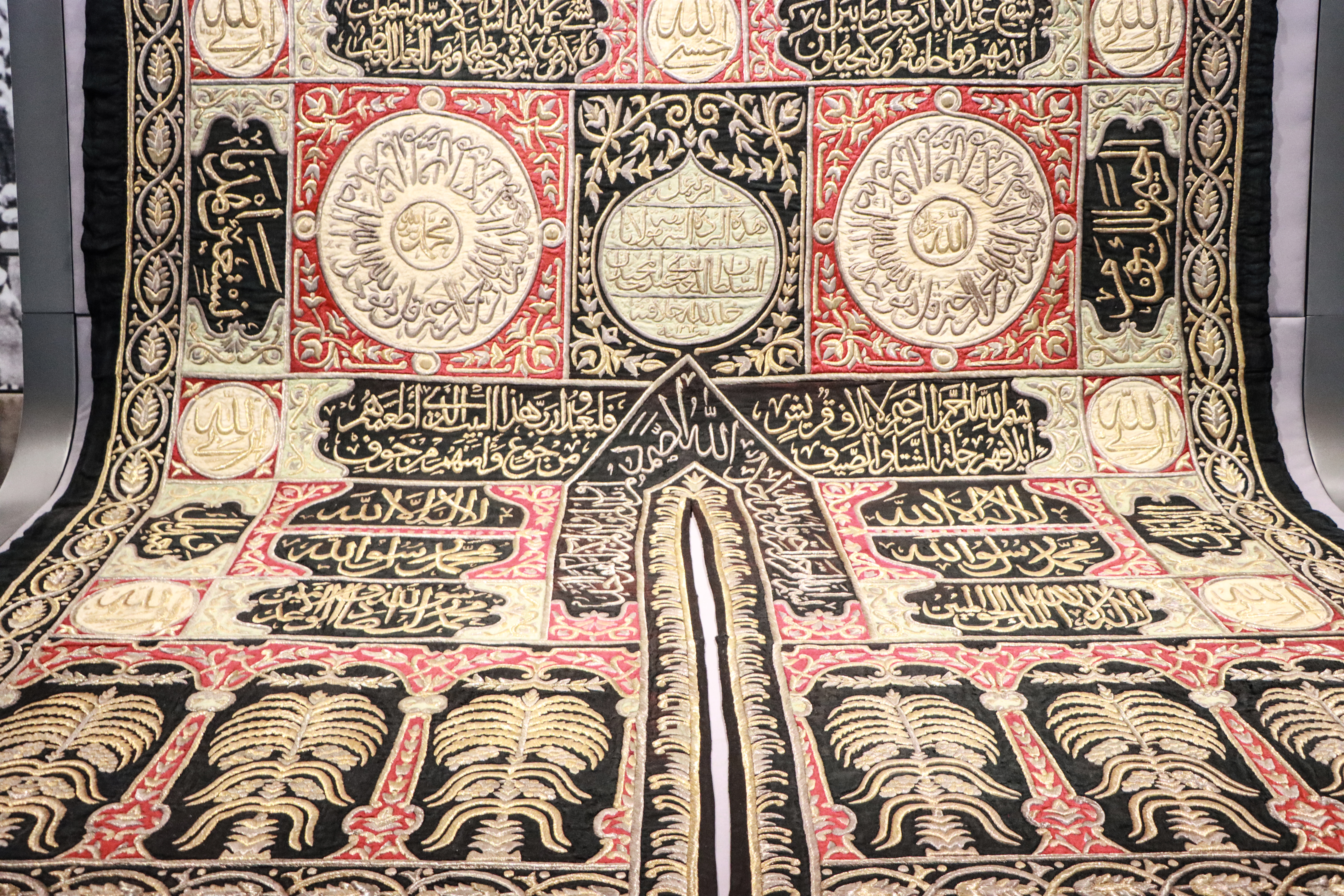 Close detail of the Ottoman-era silk and metal-thread embroidery woven into the Kaaba’s sitara, produced in Cairo in the mid-19th century.