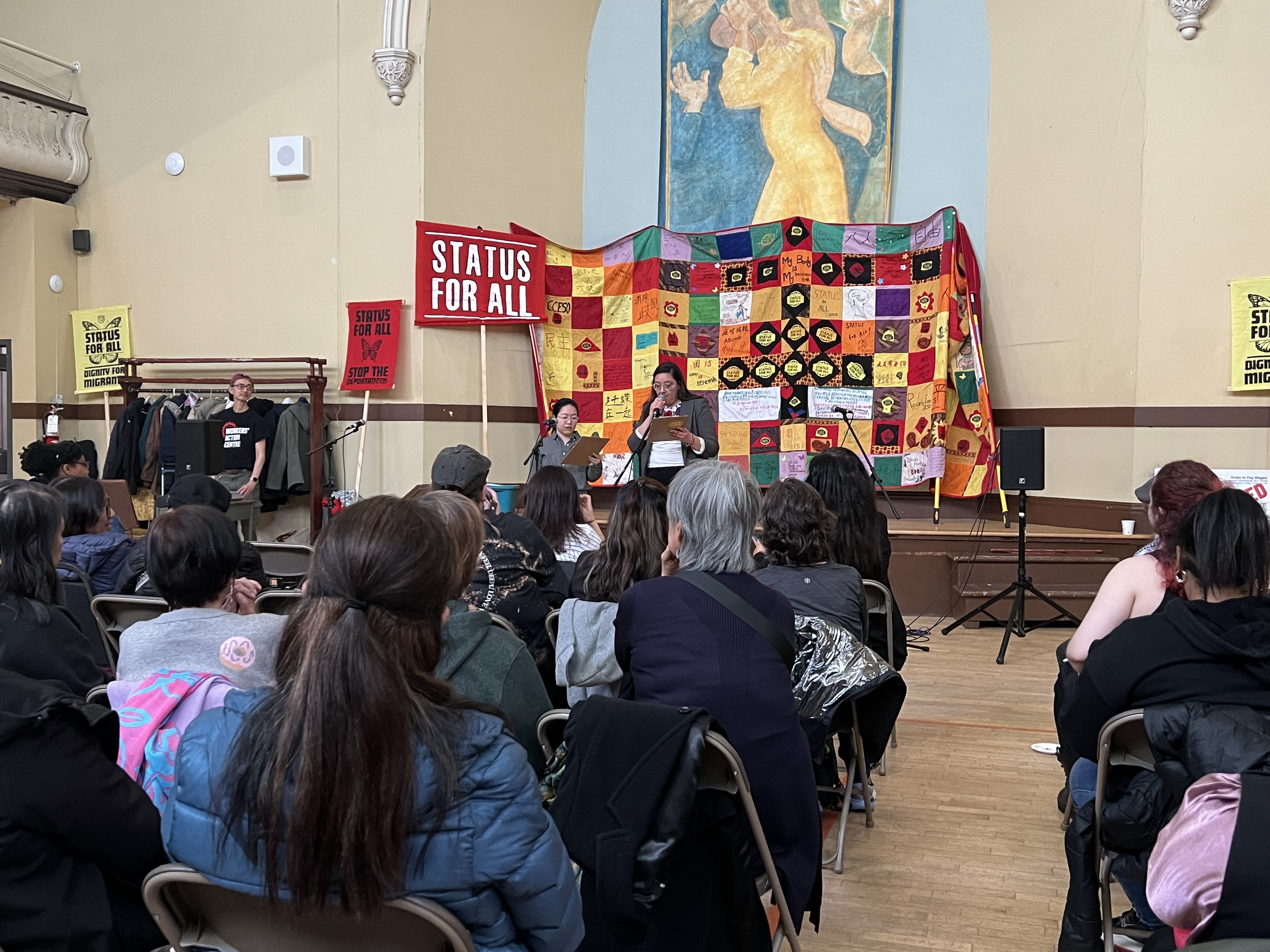 Luisa Ortiz-Garza, a migrant rights organiser at Parkdale Community Legal Services, speaks during an event in support of migrants and refugees in Toronto in late April