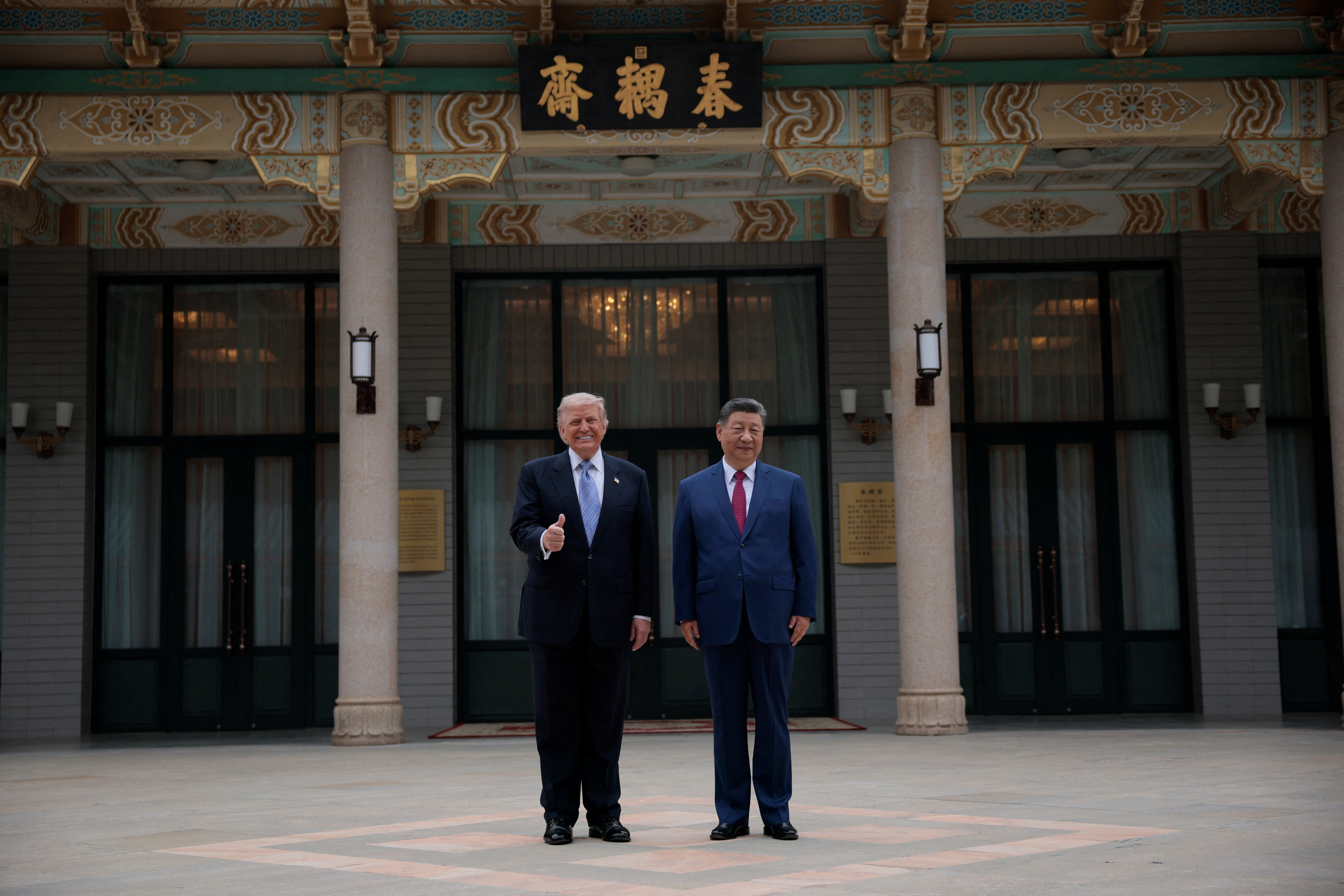 US President Donald Trump poses for a picture with Chinese President Xi Jinping during a visit to the Zhongnanhai garden in Beijing, China, on May 15, 2026