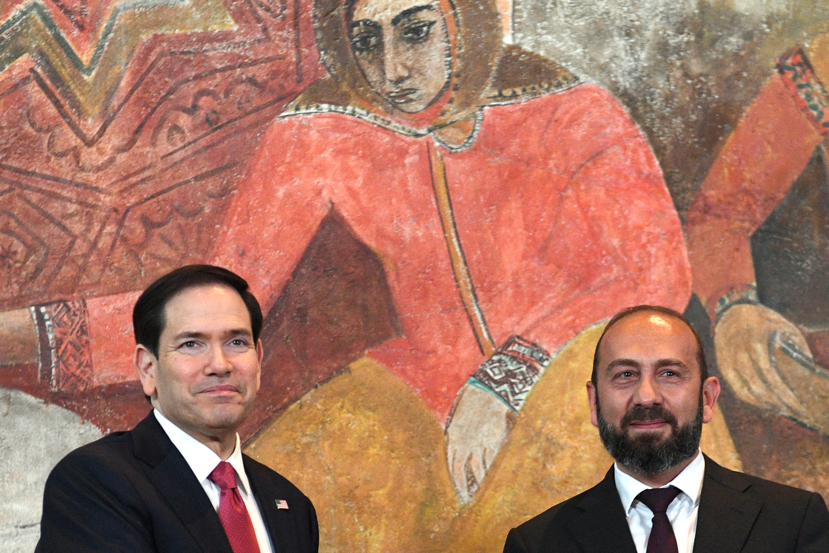 US Secretary of State Marco Rubio and Armenian Foreign Minister Ararat Mirzoyan pose at the end of their talks at Yerevan's Zvartnots international airport on May 26, 2026. (Photo by KAREN MINASYAN / AFP)