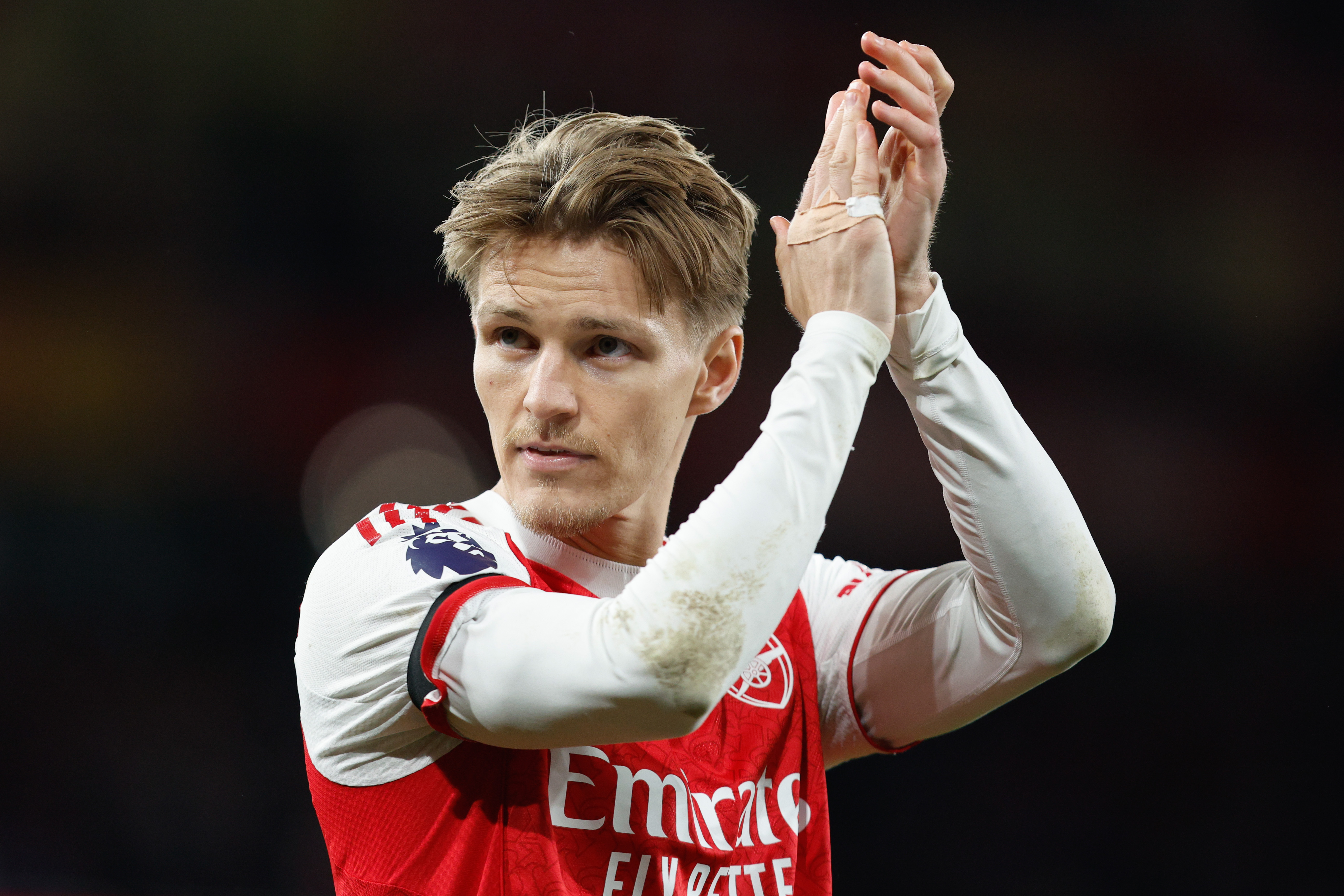 epa12972569 Martin Odegaard of Arsenal celebrates at the end of the English Premier League match Arsenal FC against Burnley FC, in London, Britain, 18 May 2026. EPA/DAVID CLIFF EDITORIAL USE ONLY. No use with unauthorized audio, video, data, fixture lists, club/league logos, 'live' services or NFTs. Online in-match use limited to 120 images, no video emulation. No use in betting, games or single club/league/player publications.