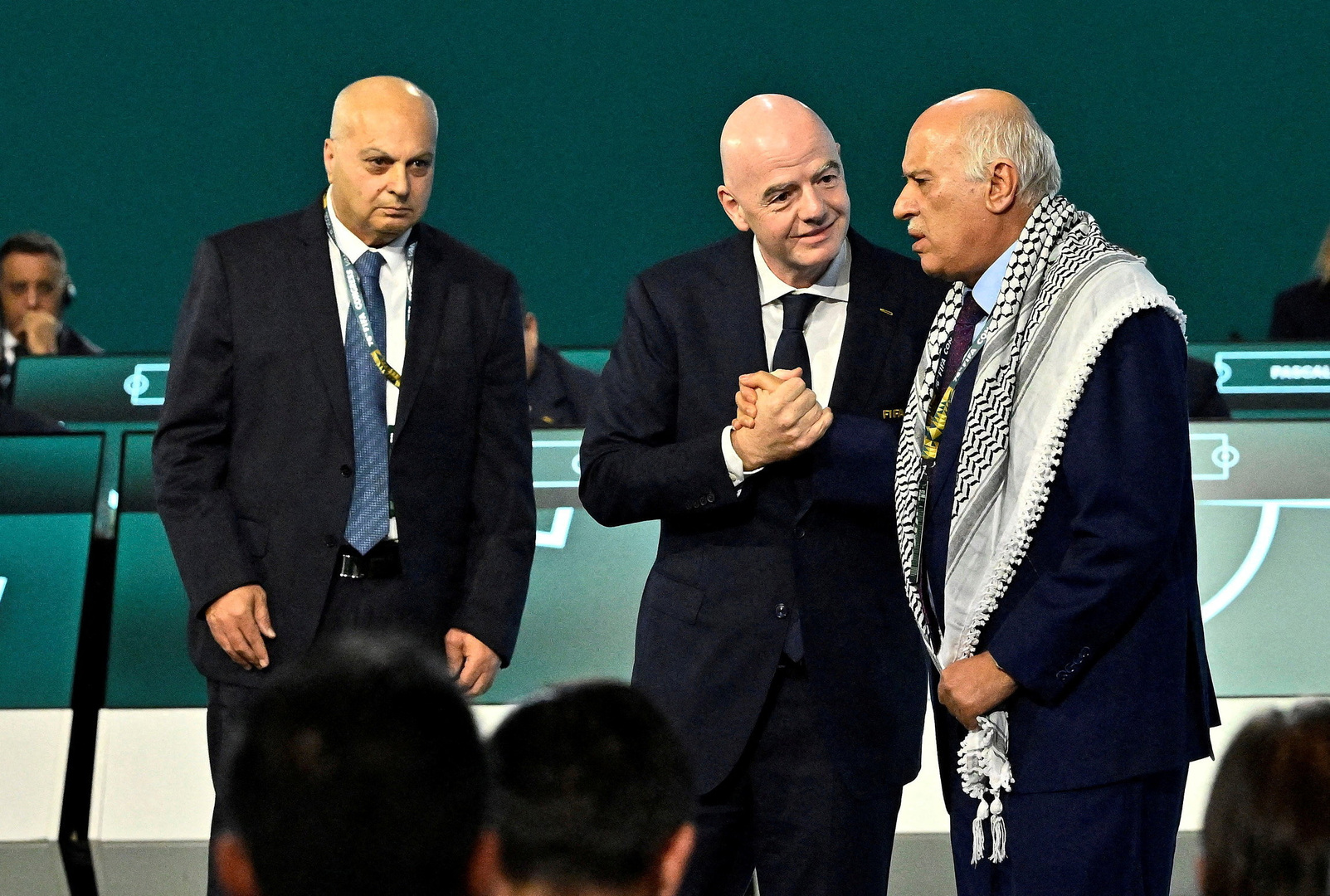 Soccer Football - 76th FIFA Congress - Vancouver Convention Centre, Vancouver, Canada - April 30, 2026 FIFA President Gianni Infantino with Jibril Rajoub, President of the Palestine Football association during the congress REUTERS/Jennifer Gauthier
