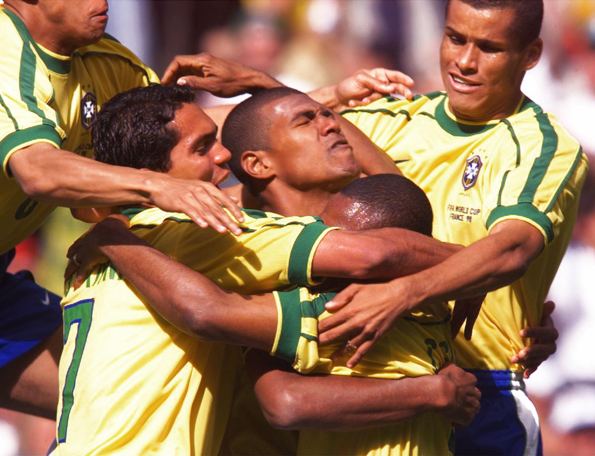 Brazil’s Cesar Sampaio, second from right, is mobbed by his teammates after scoring the first goal of the 1998 World Cup against Scotland during their first-round World Cup match