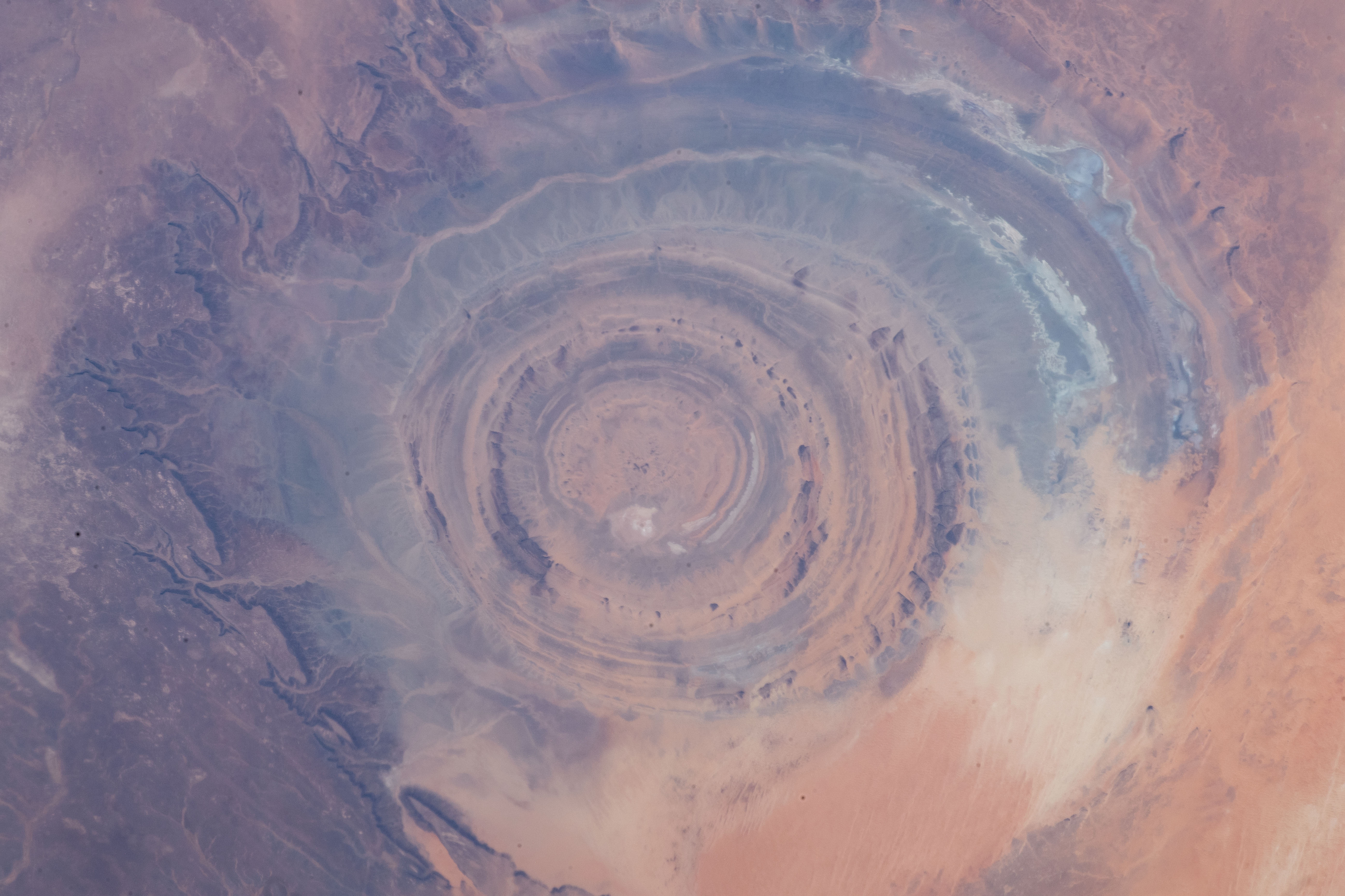 The Richat Structure, a circular geological dome that has eroded to expose rock layers known as the ‘Eye of the Sahara’ in northwestern Mauritania, is captured from the International Space Station on March 5, 2019