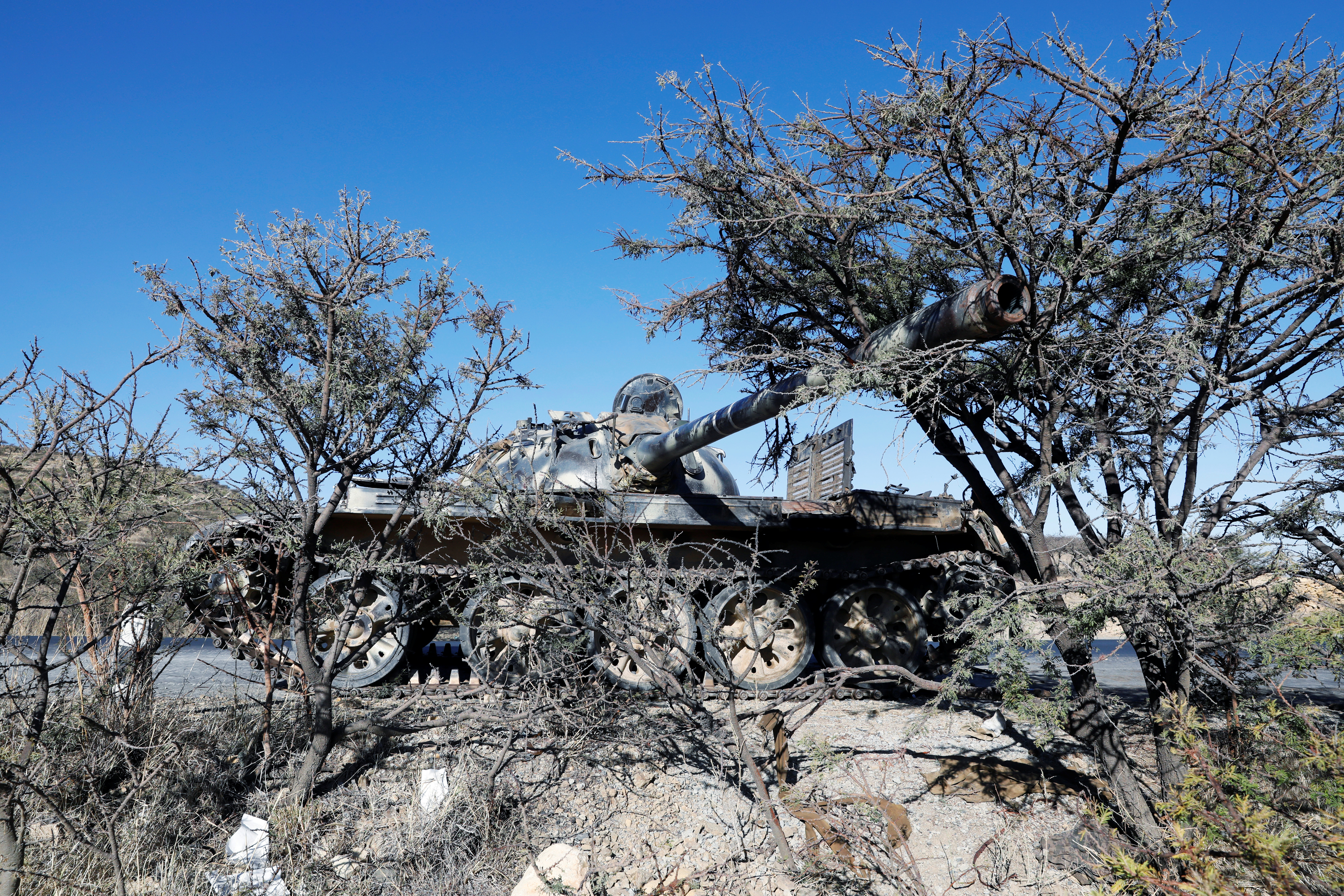 A damaged Eritrean military tank is seen near the town of Wikro, Ethiopia, March 14, 2021.Picture taken March 14, 2021.REUTERS/Baz Ratner