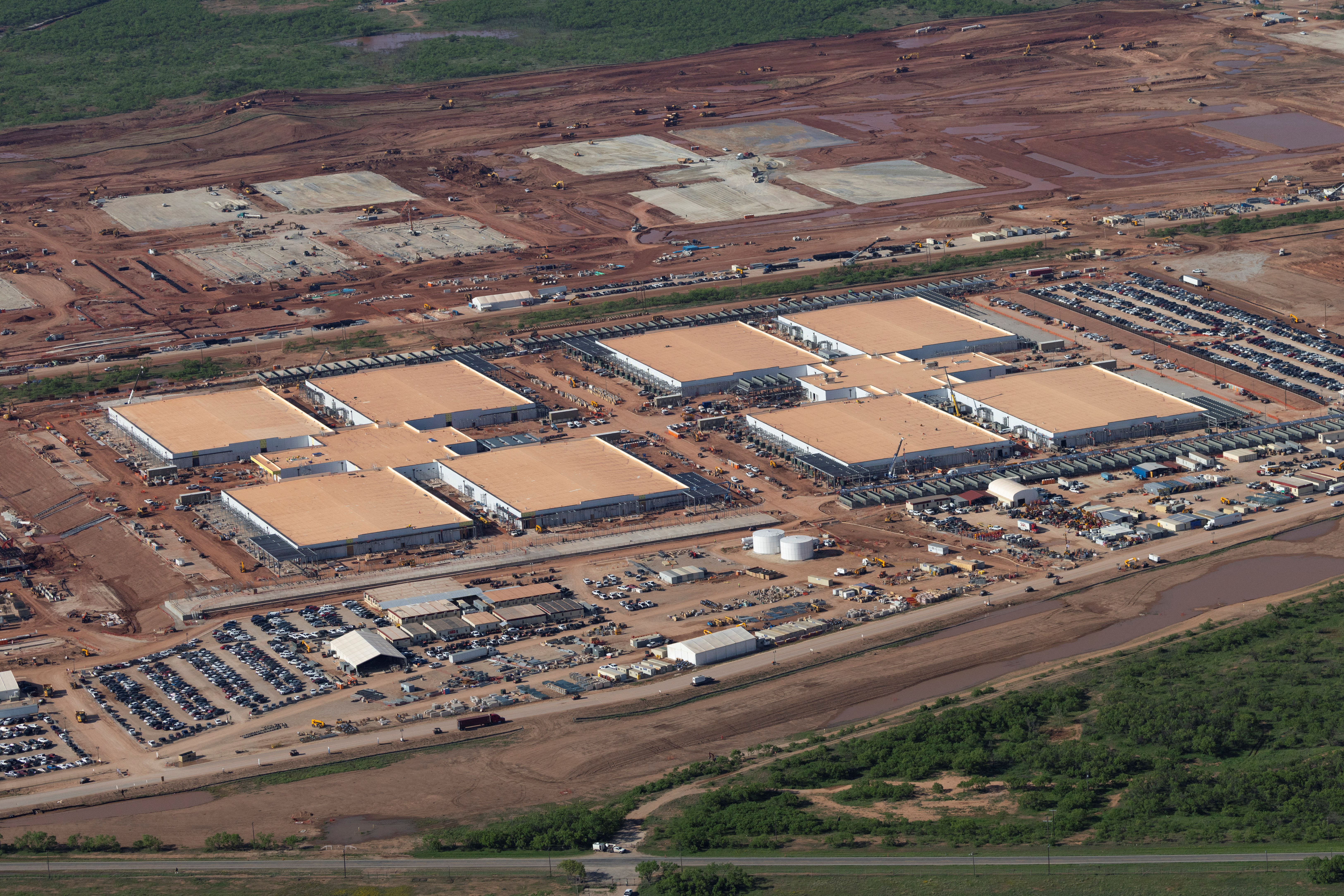 An aerial view shows construction under way on a Project Stargate AI infrastructure site, a collaboration between three large tech companies – OpenAI, SoftBank, and Oracle – in Abilene, Texas, United States, on April 23, 2025