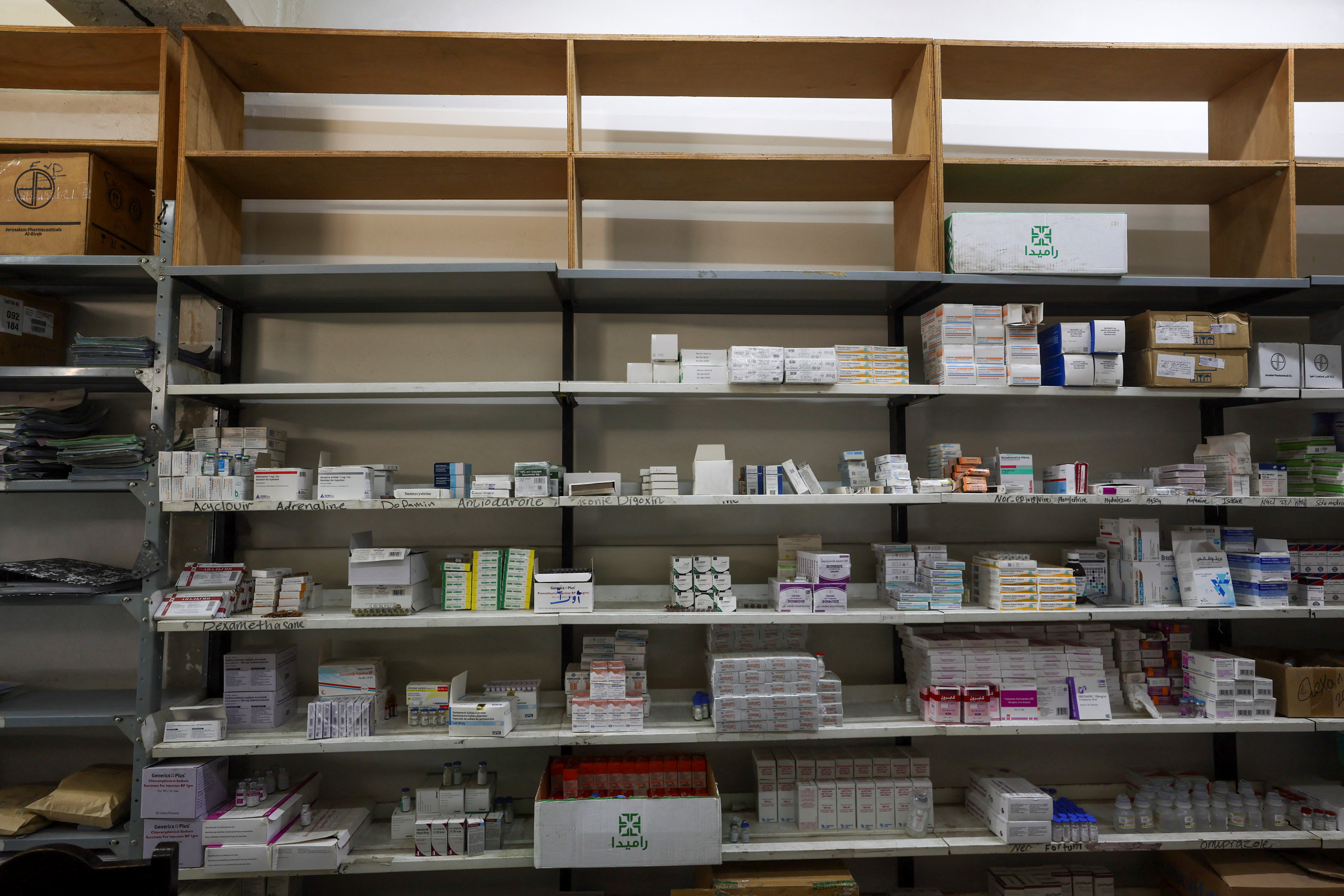 Medicine shelves at Al-Ahli Arab Hospital as medical supplies run critically low