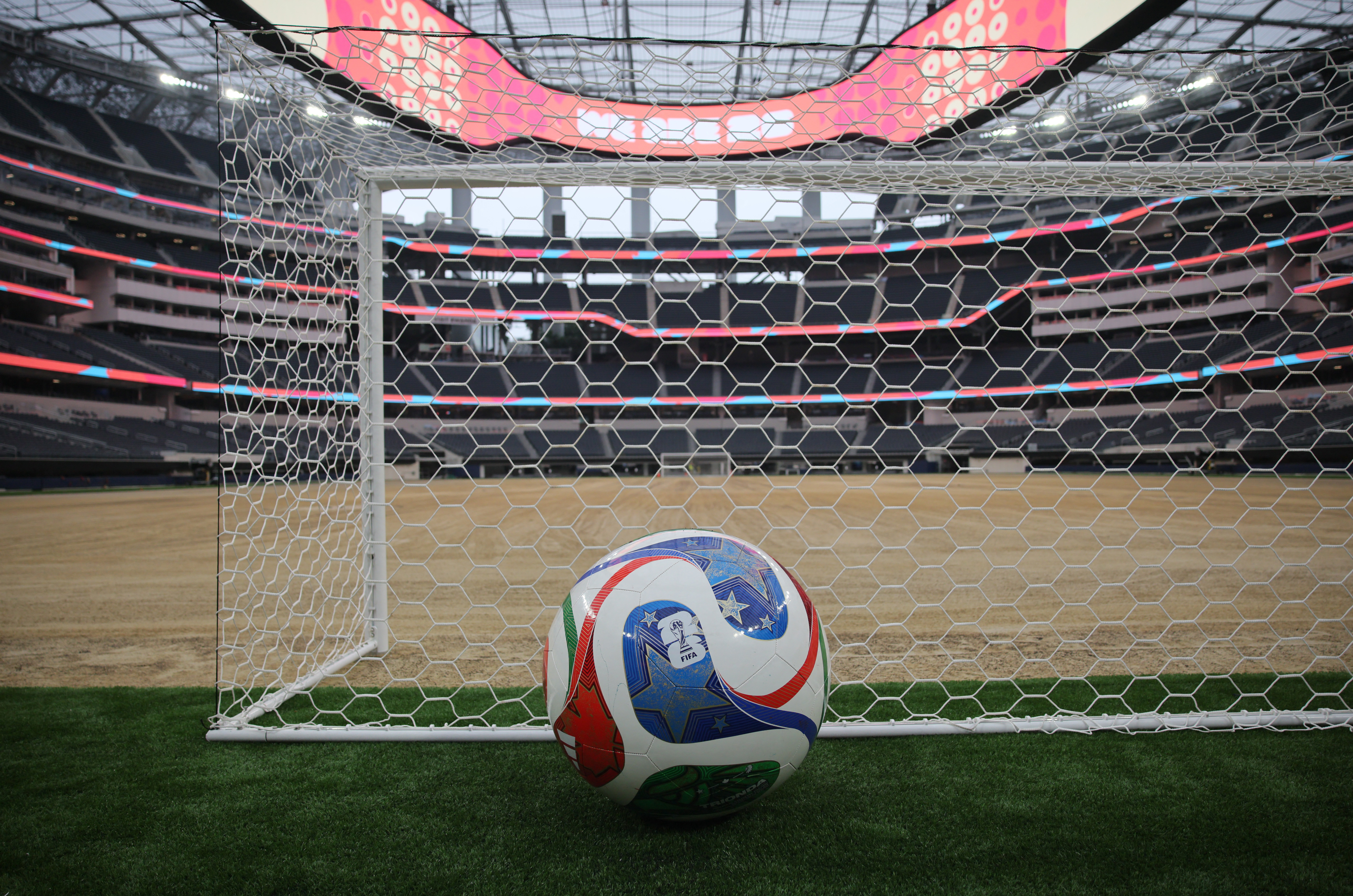 'Trionda' - translated from Spanish as "three waves" is the official match ball for the World Cup 2026 set to be hosted in the U.S., Canada and Mexico. The ball has a sensor chip inside it to track movement. [Daniel Cole/Reuters]