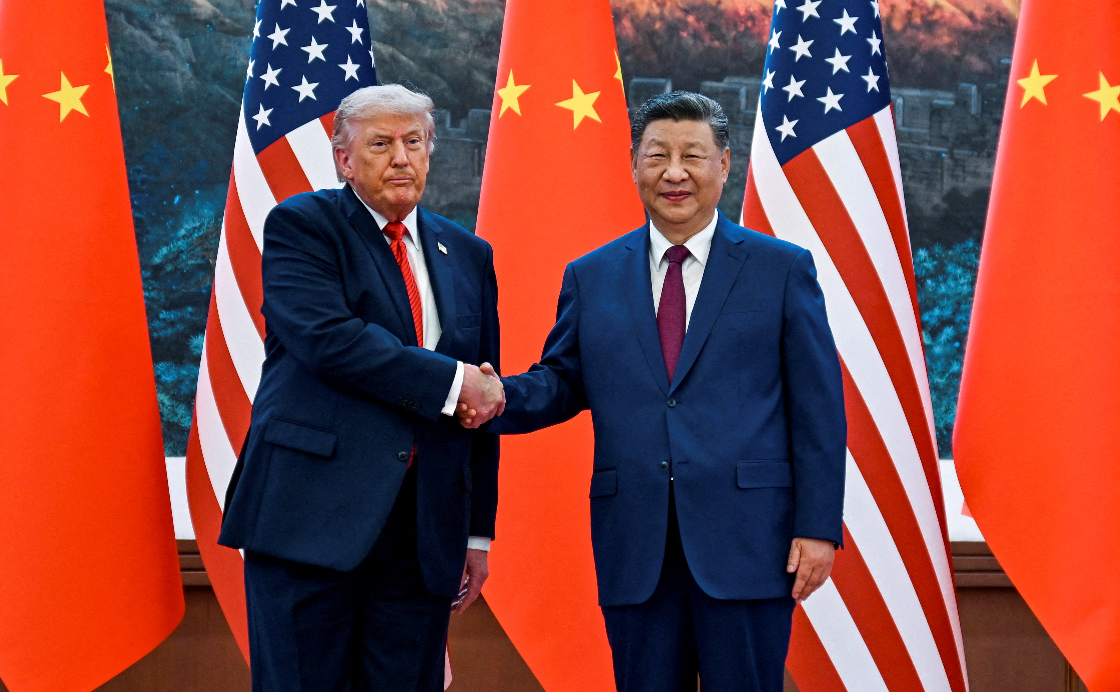 US President Donald Trump shakes hands with Chinese leader Xi Jinping at the Great Hall of the People in Beijing, China, on May 14, 2026