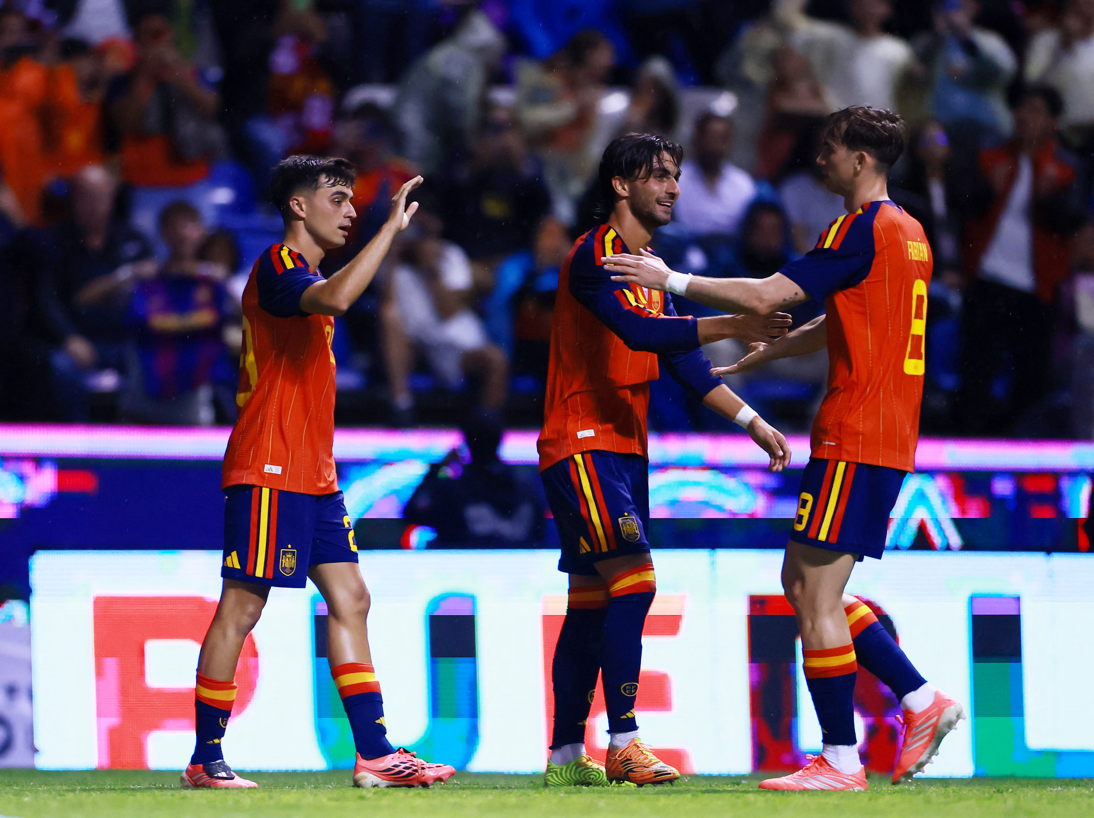 Spanish players celebrate