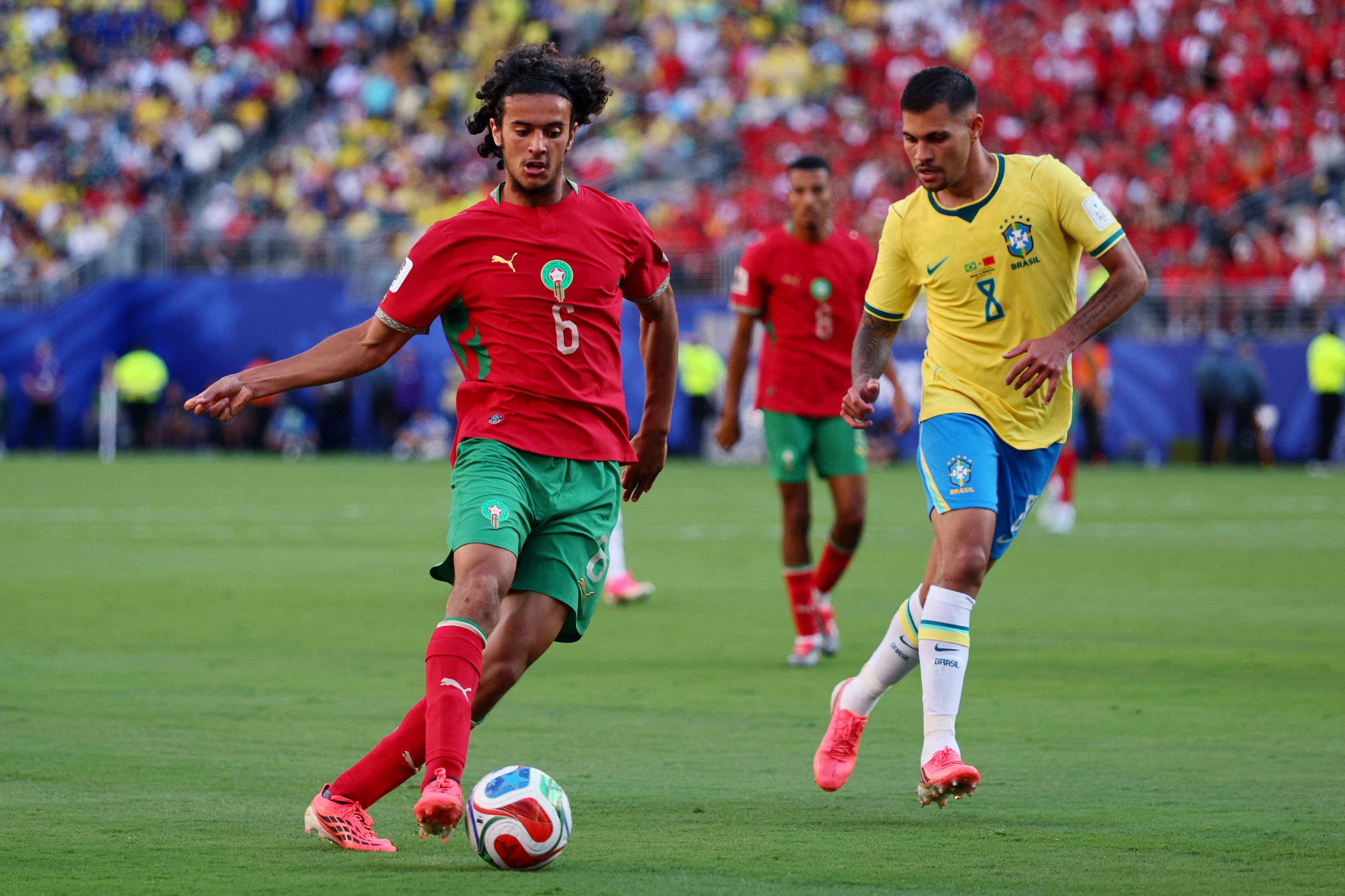 Soccer Football - FIFA World Cup 2026 - Group C - Brazil v Morocco - New York/New Jersey Stadium, East Rutherford, New Jersey, U.S. - June 13, 2026 Morocco's Ayyoub Bouaddi in action with Brazil's Bruno Guimaraes IMAGN IMAGES via Reuters/Caean Couto