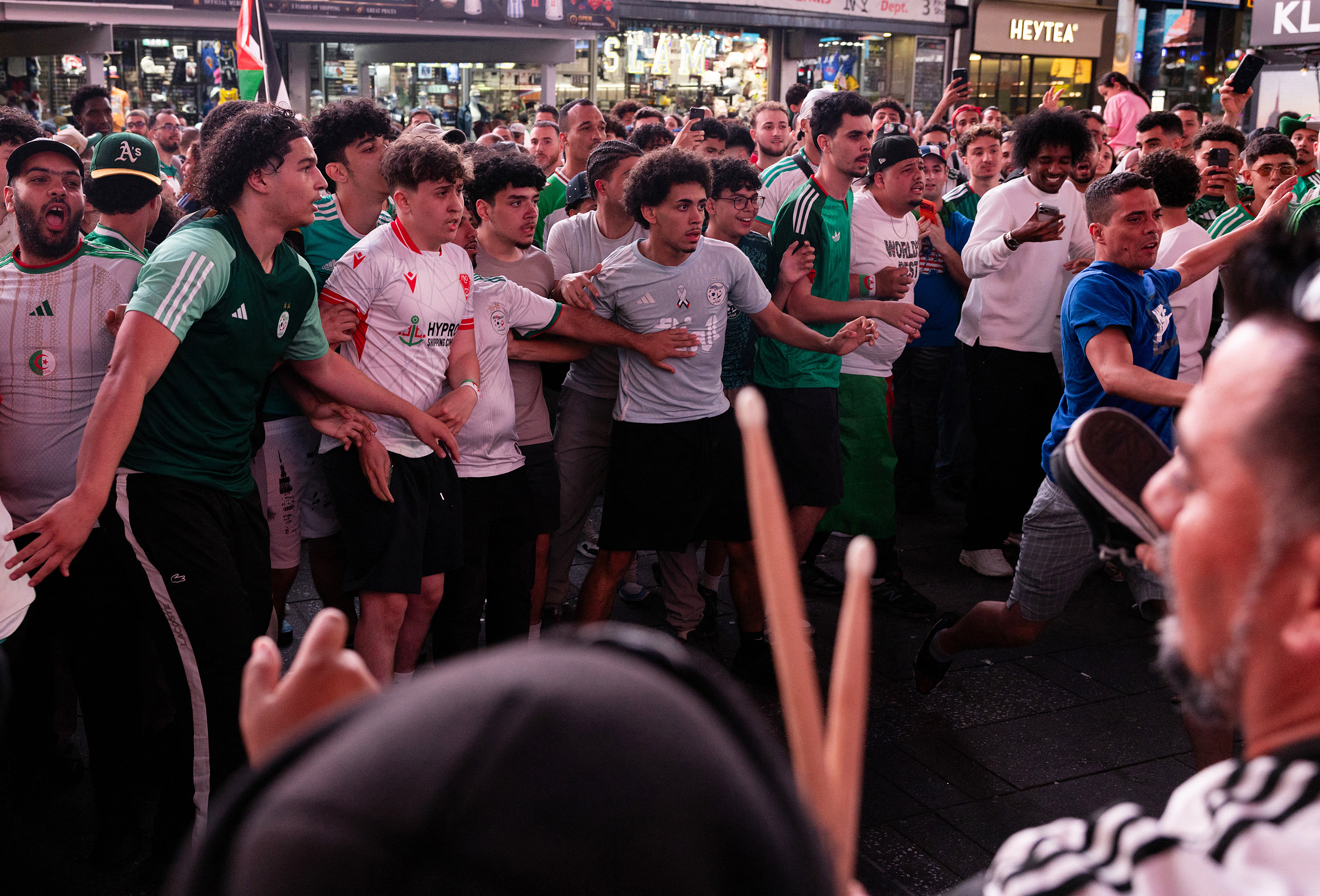 Algeria fans clash with Argentina fans as they gather in Times Square