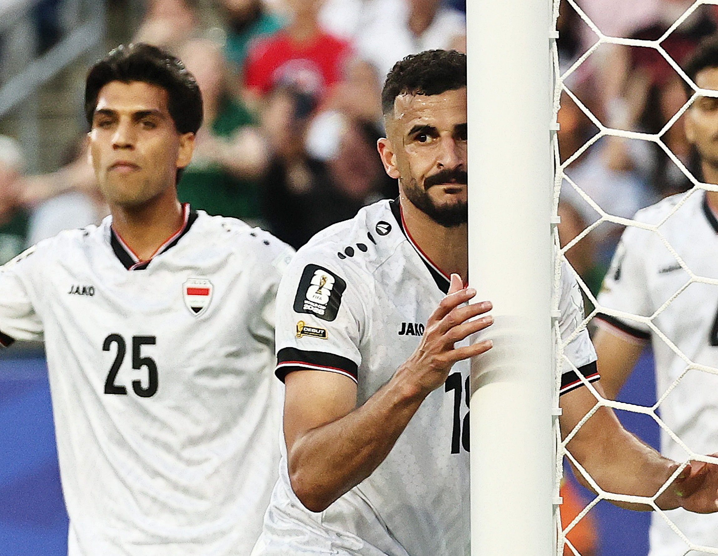 Iraq’s Aymen Hussein (#18) looks dejected after scoring Norway’s fourth with an own goal at Boston Stadium on June 16