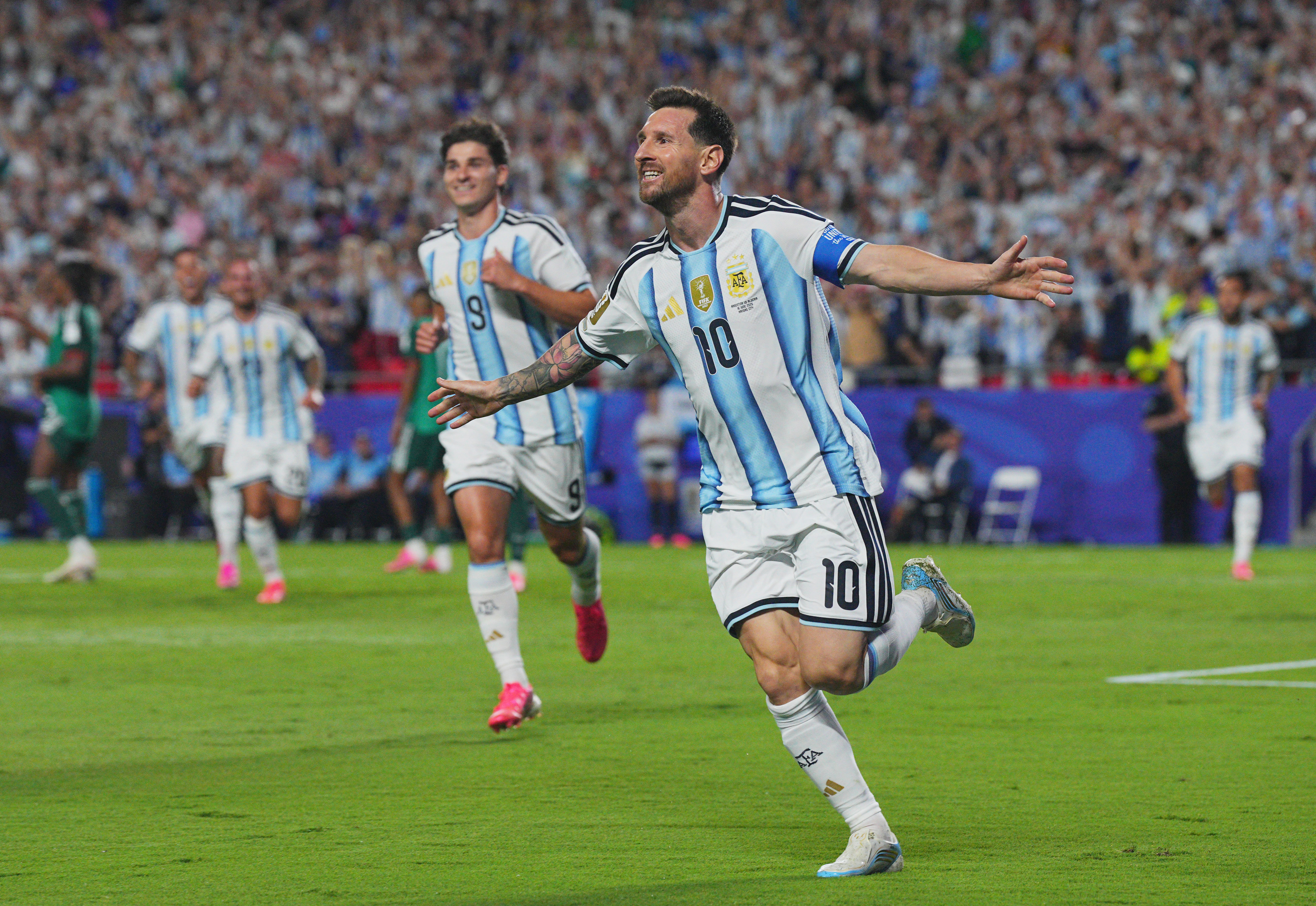 Argentina's Lionel Messi celebrates scoring their second goal