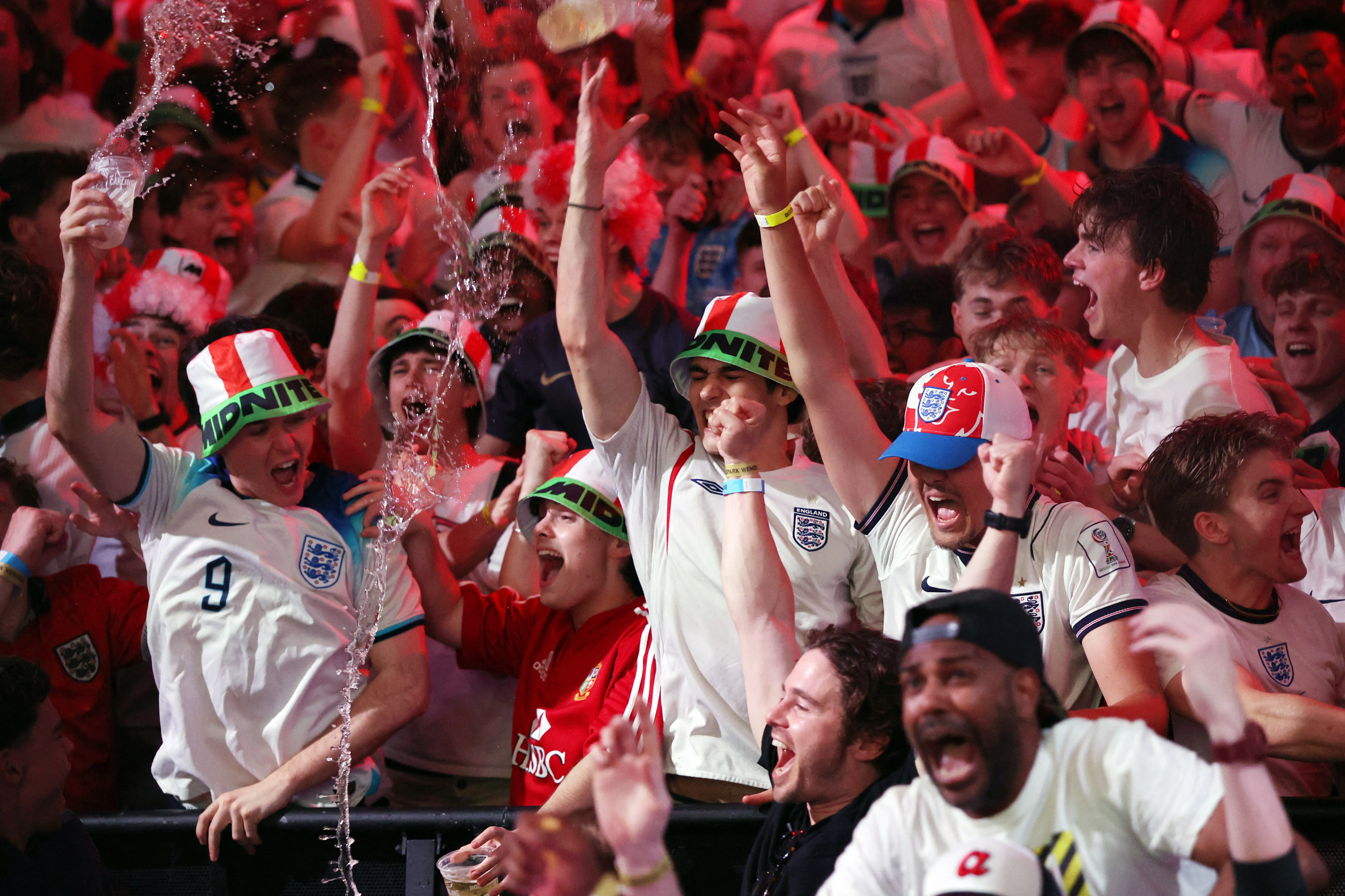 Soccer Football - FIFA World Cup 2026 - Group L - England v Croatia - Fans gather in London - BOXPARK Wembley, London, Britain - June 17, 2026 England fans in London celebrate after the end of the match REUTERS/Chris Radburn