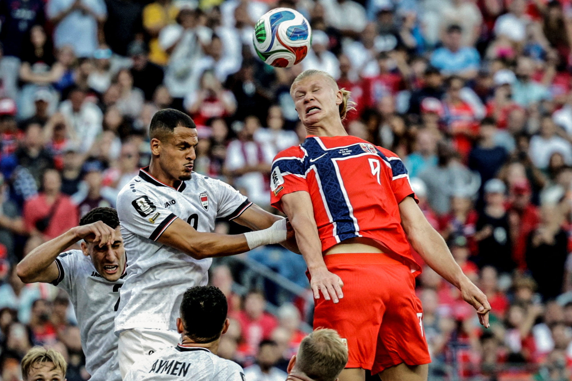 Norway’s Erling Haaland is challenged by Iraq’s Ali Al Hamadi