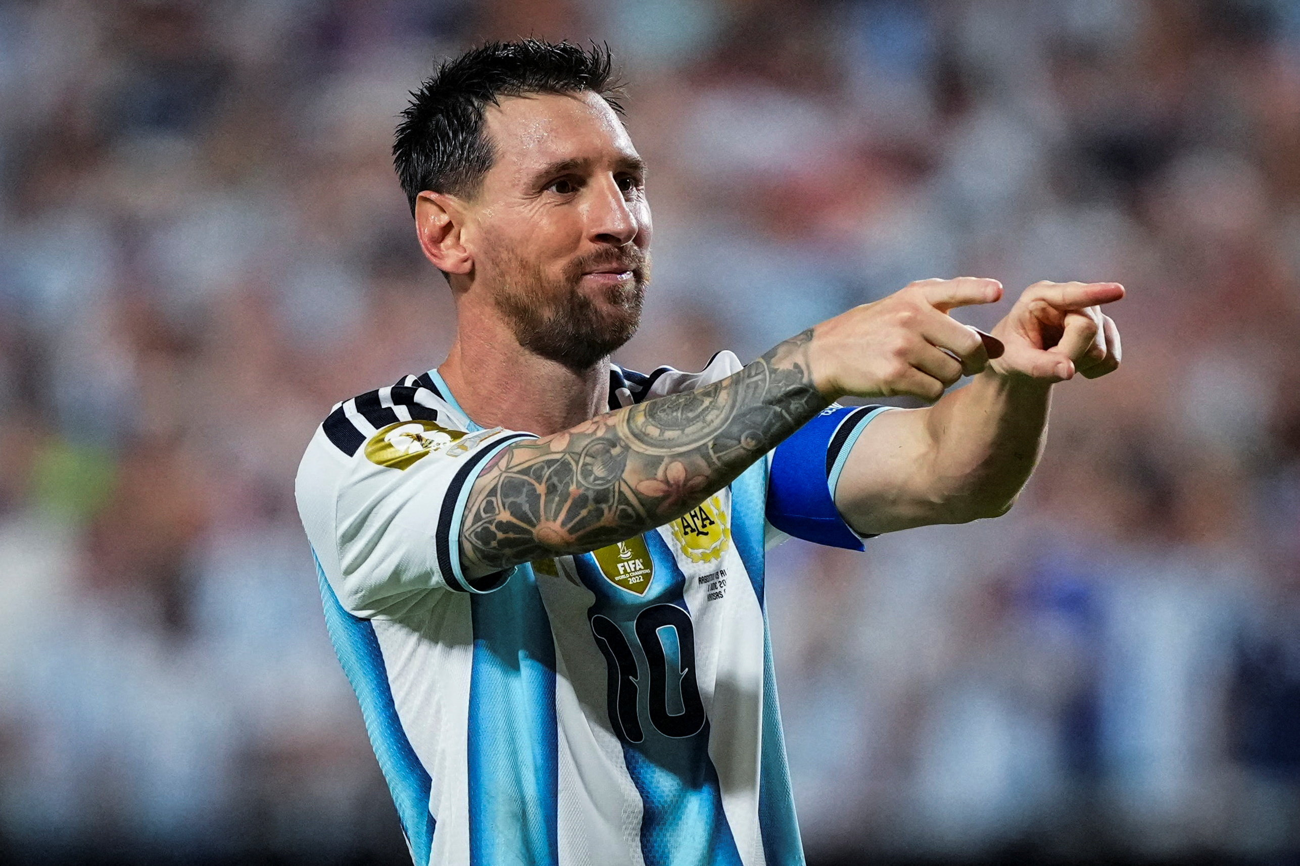 Argentina's Lionel Messi points and celebrates.