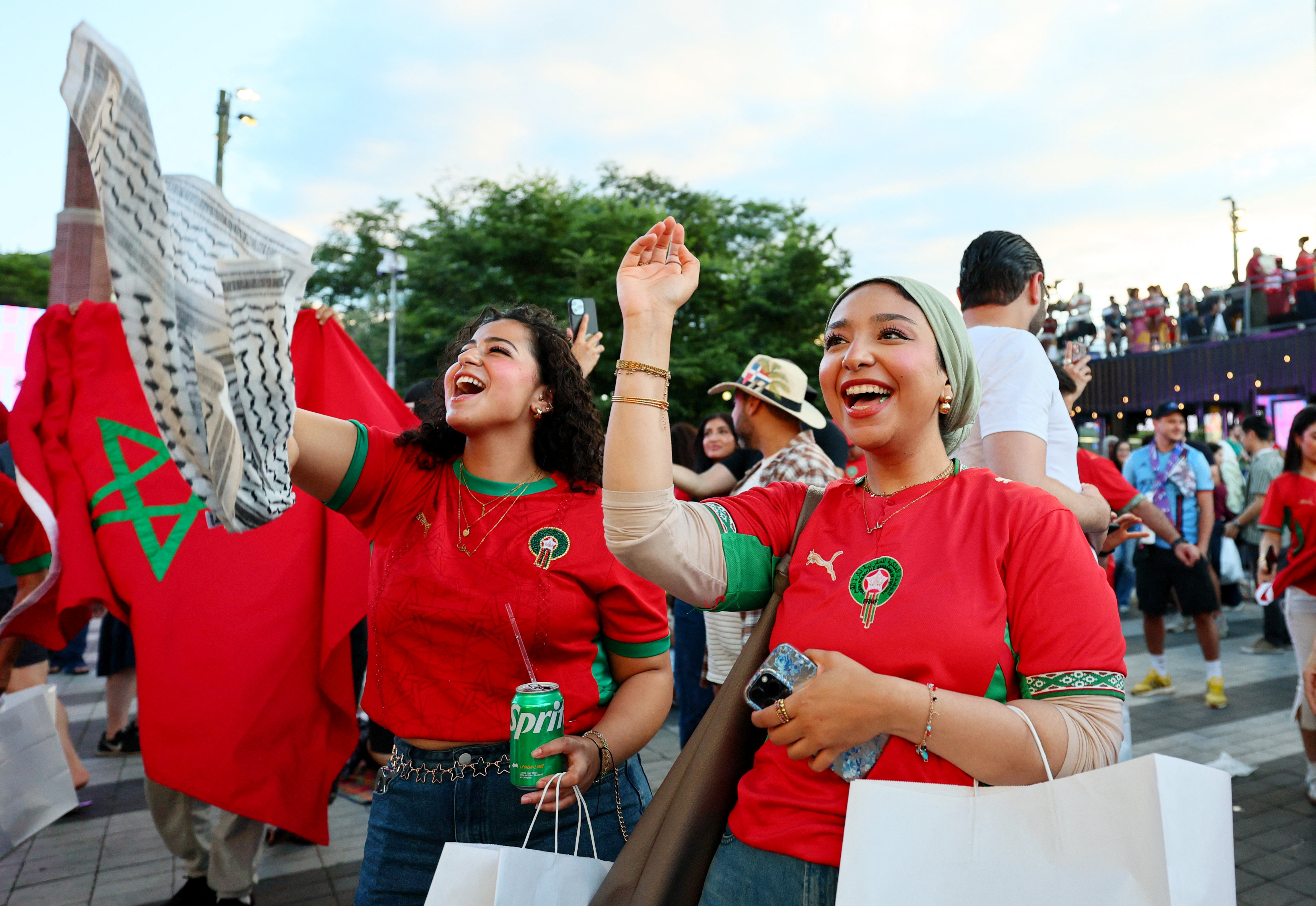 Soccer Football - FIFA World Cup 2026 - Group C - Scotland v Morocco - Fans gather in New York City - New York City, New York, U.S. - June 19, 2026 Morocco fans celebrate after the match at the Brooklyn Bridge park watch party IMAGN IMAGES via Reuters/Caean Couto