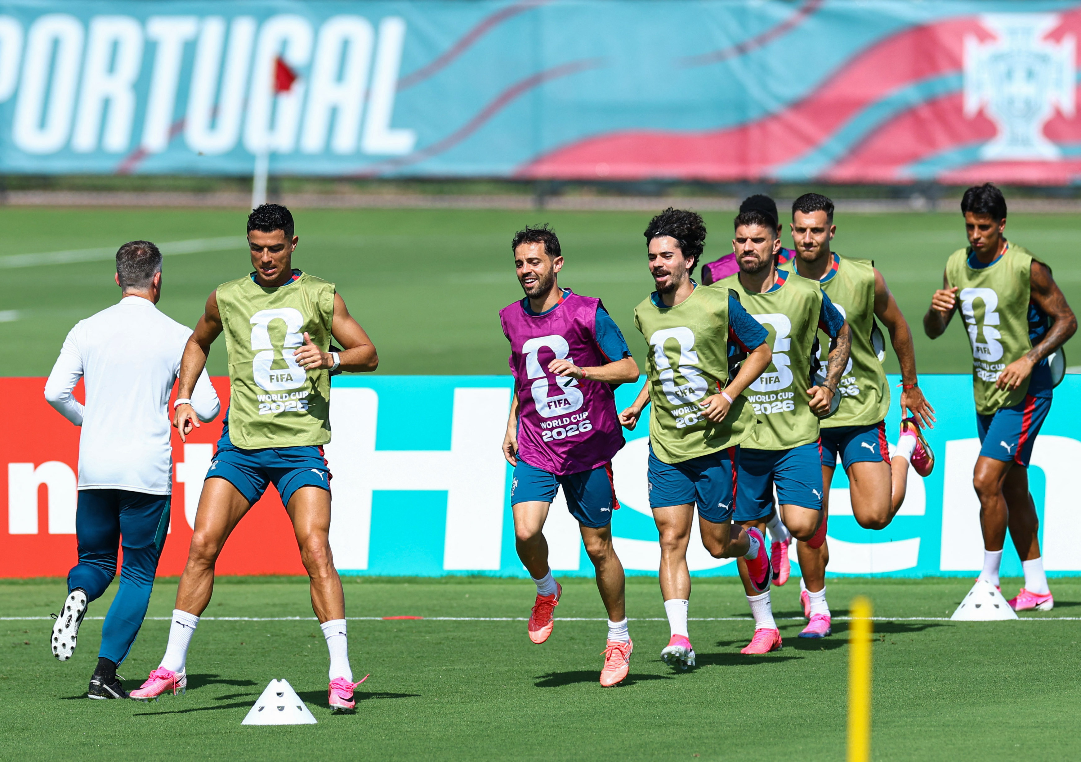 Soccer Football - FIFA World Cup 2026 - Portugal Training - Gardens North County District Park, Palm Beach Gardens, Florida, U.S. - June 22, 2026 Portugal's Cristiano Ronaldo, Ruben Neves, Vitinha, Joao Cancelo, Diogo Dalot and Bernardo Silva during training REUTERS/Marco Bello