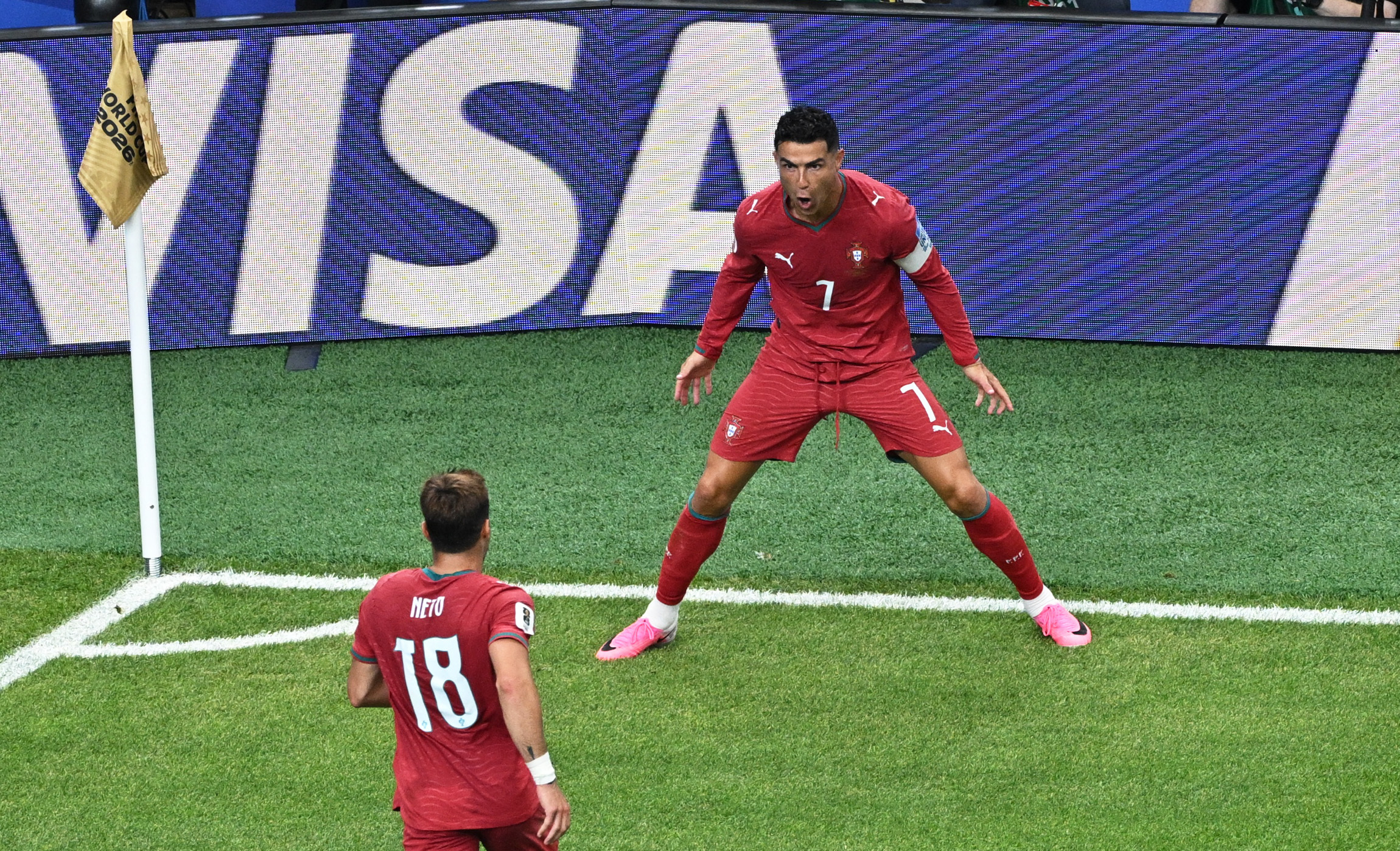 Soccer Football - FIFA World Cup 2026 - Group K - Portugal v Uzbekistan - Houston Stadium, Houston, Texas, U.S. - June 23, 2026 Portugal's Cristiano Ronaldo celebrates scoring their third goal with Pedro Neto REUTERS/Annegret Hilse