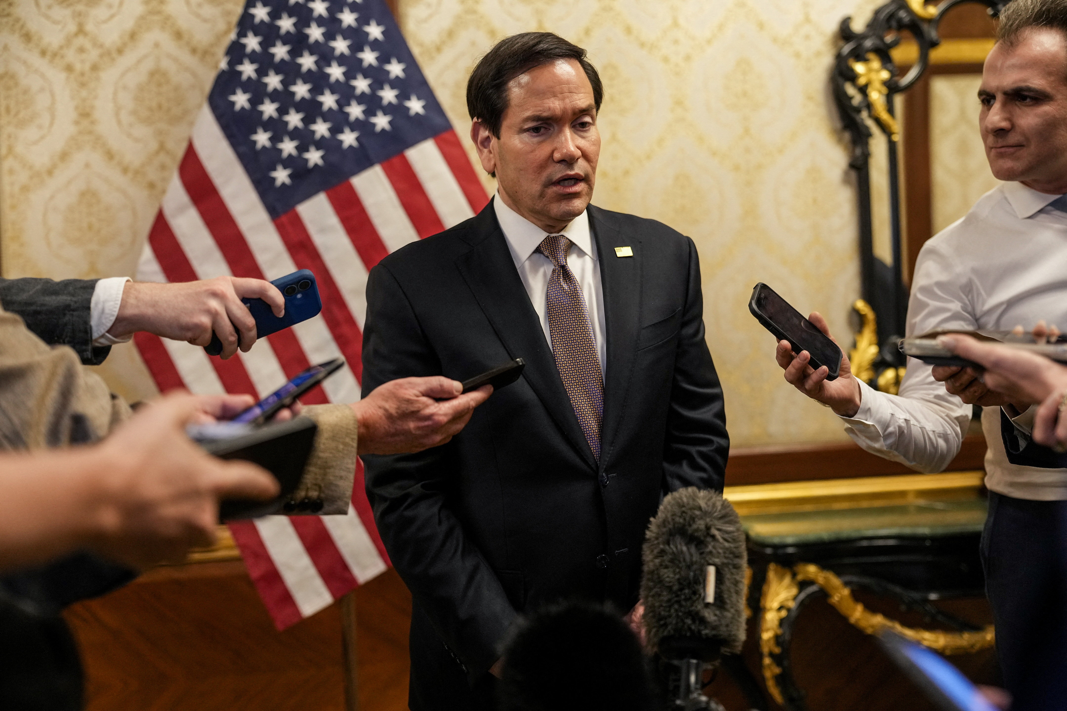 US Secretary of State Marco Rubio speaks to members of the media at Kuwait International Airport, June 24, 2026. [Eric Lee/Reuters]