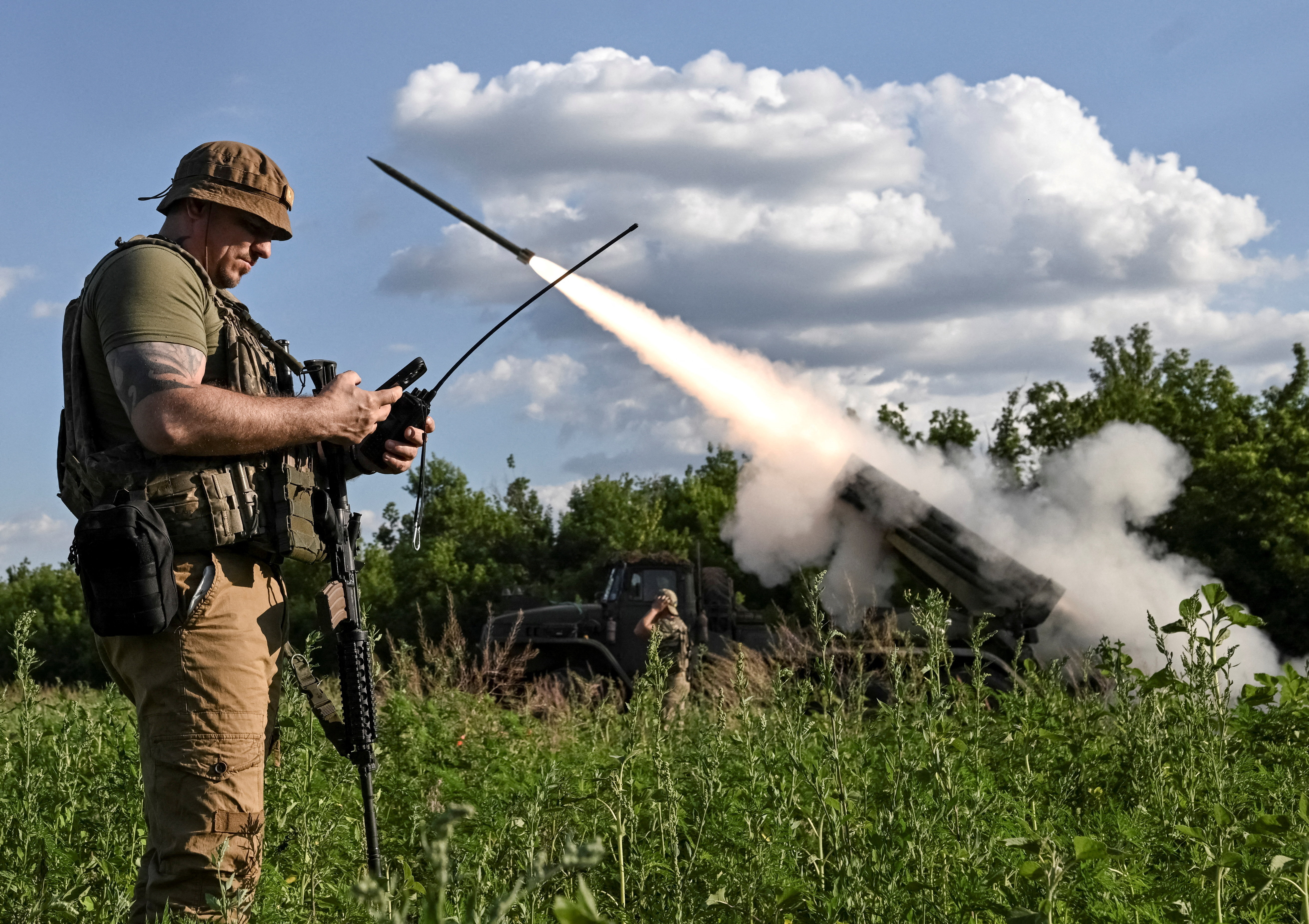 Ukrainian servicemen fire multiple launch rocket system towards Russian troops