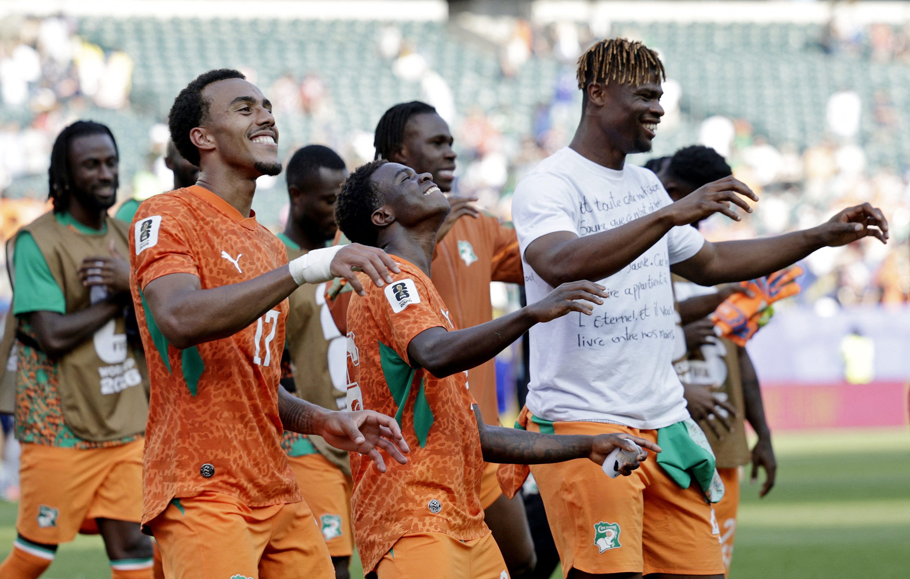 Soccer Football - FIFA World Cup 2026 - Group E - Curacao v Ivory Coast - Philadelphia Stadium, Philadelphia, Pennsylvania, U.S. - June 25, 2026 Ivory Coast's Guela Doue and teammates celebrate after the match as Ivory Coast qualify for the knockout stages of the World Cup REUTERS/Pilar Olivares