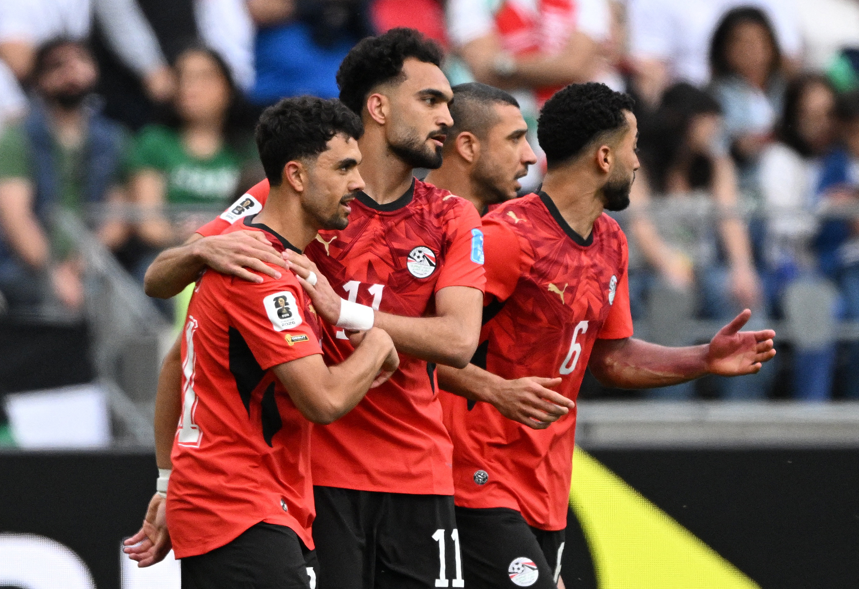 Soccer Football - FIFA World Cup 2026 - Group G - Egypt v Iran - Seattle Stadium, Seattle, Washington, U.S. - June 26, 2026 Egypt's Mahmoud Saber celebrates scoring their first goal with Mostafa Zico and Mohamed Abdelmoniem IMAGN IMAGES via Reuters/Troy Wayrynen