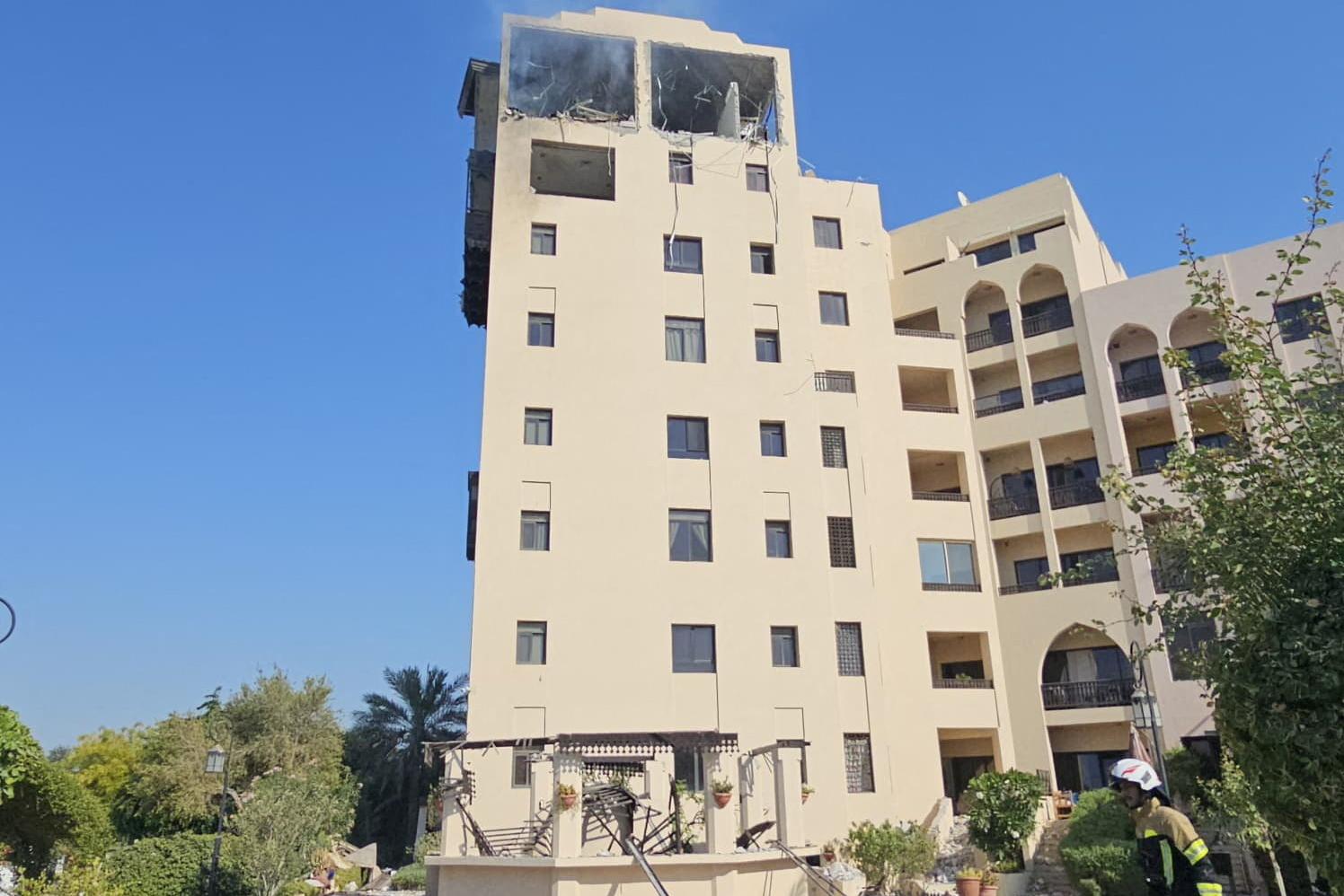 Smoke rises from a residential building in Muharraq, Bahrain, after it was hit by an Iranian drone on June 28, 2026