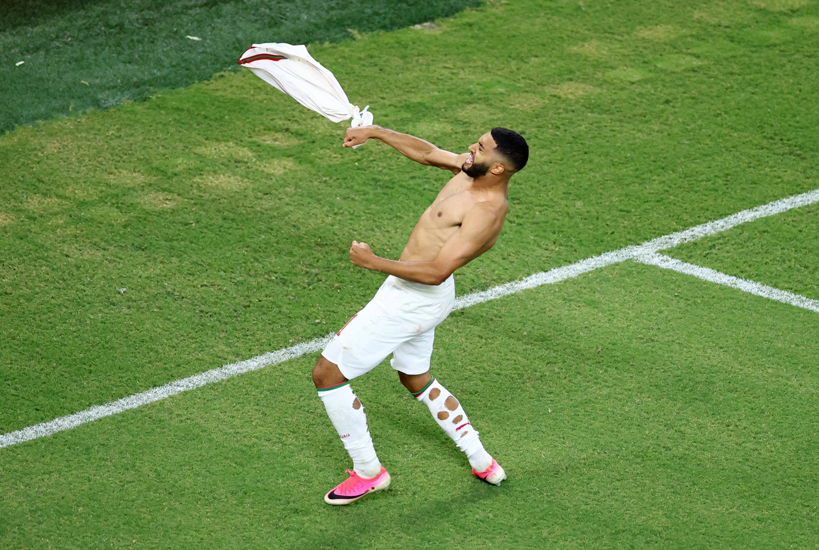 Soccer Football - FIFA World Cup 2026 - Round of 32 - Netherlands v Morocco - Estadio Monterrey, Monterrey, Mexico - June 29, 2026 Morocco's Ismael Saibari celebrates scoring a penalty during the penalty shootout to win the match as Morocco qualify for the round of 16 stage of the World Cup REUTERS/Raquel Cunha
