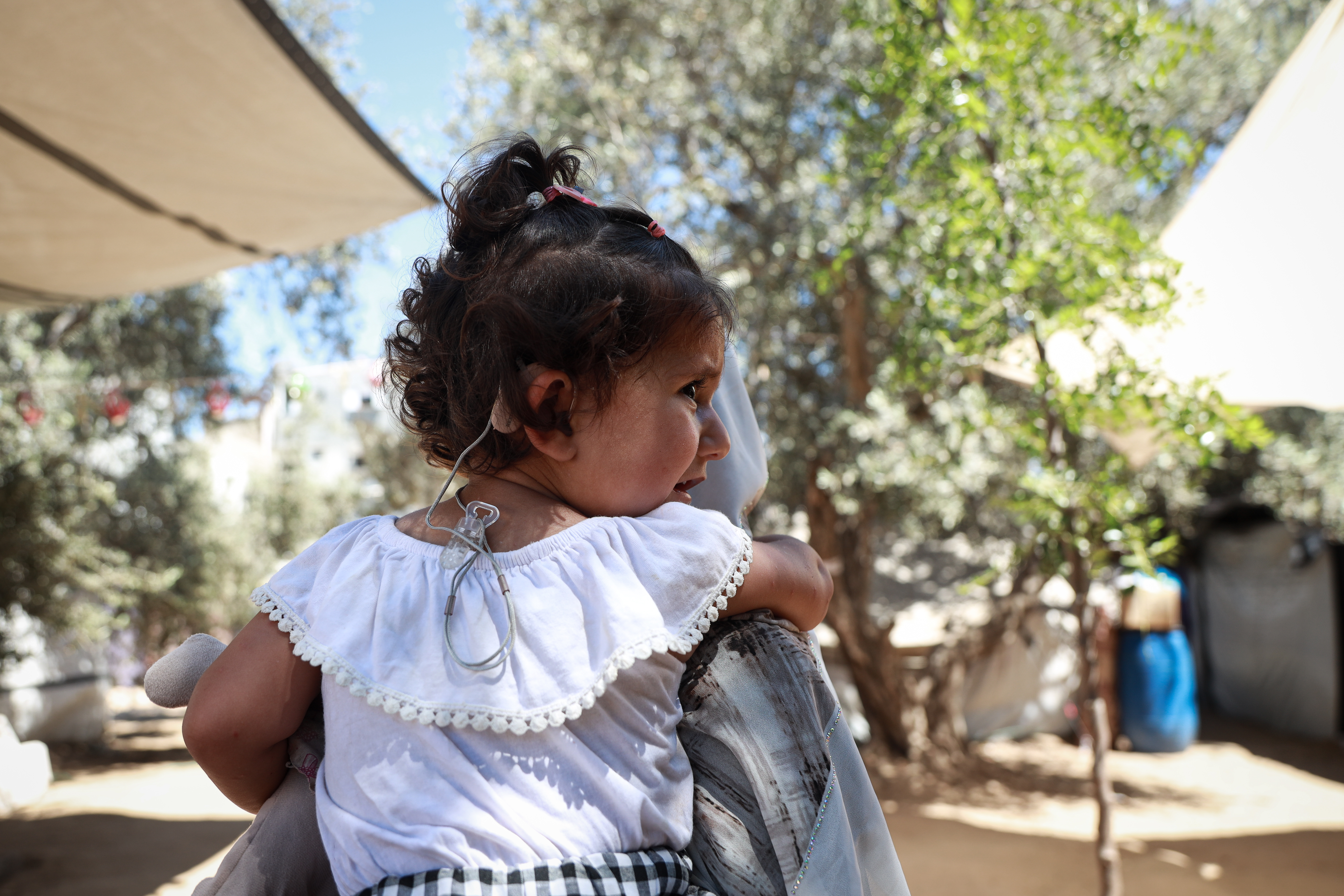 Doctors say that Wateen al-Ajrami needs to travel outside Gaza for cochlear implant surgery, ideally before she reaches the age of five