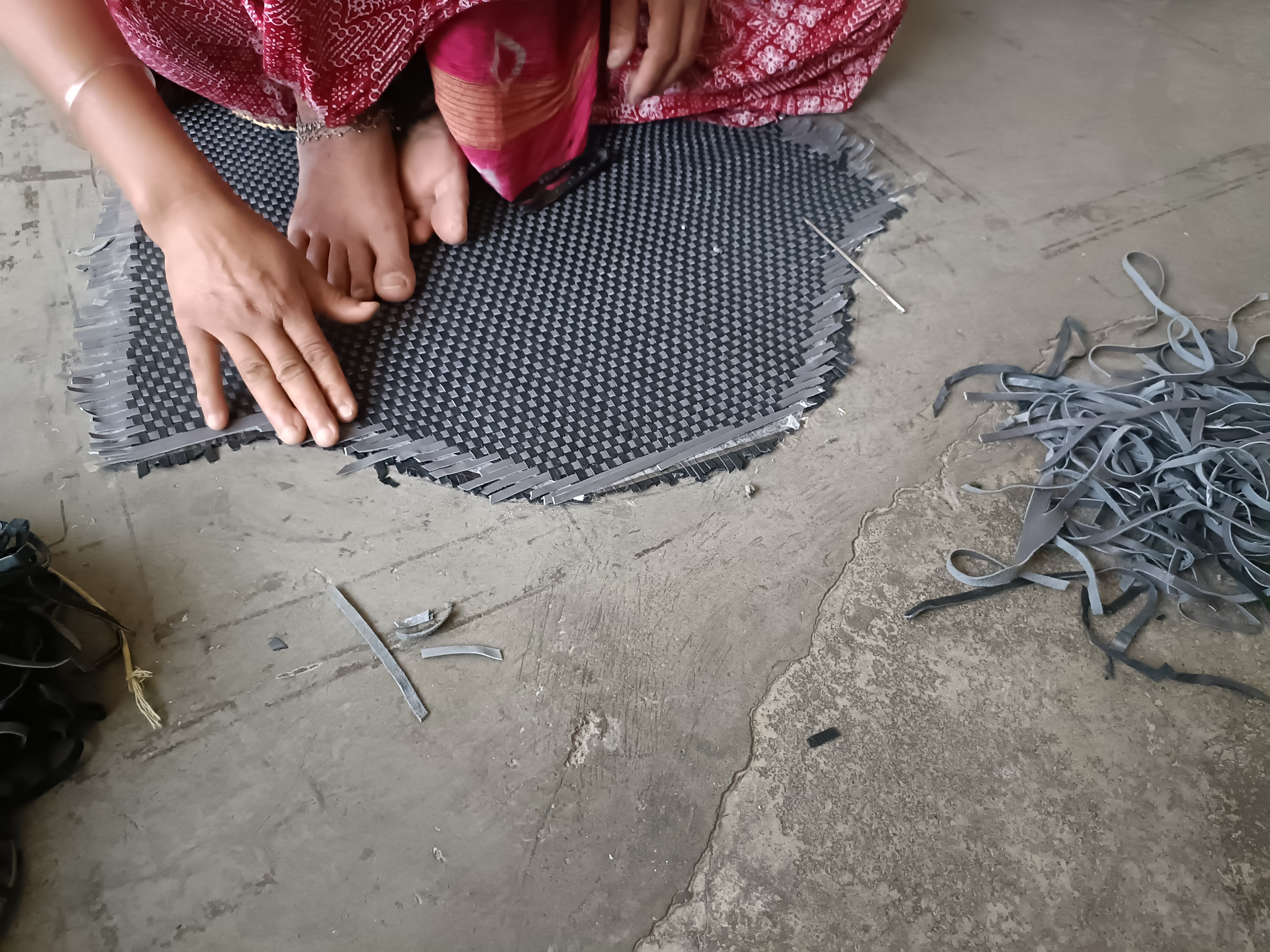 The leather panel of a jacket that Bano is working on in New Delhi, India