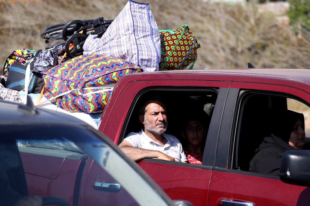 Displaced Lebanese citizens pack their belongings onto vehicles as they cautiously return to their homes following a mutual agreement reached between the US and Iran, in Beirut, Lebanon on June 15, 2026. Despite warnings from local authorities advising residents not to rush back immediately, vehicular traffic surged toward settlements in the southern part of the country as numerous families hit the road to check on their homes and lands. Photojournalist:Mohammad Abushama