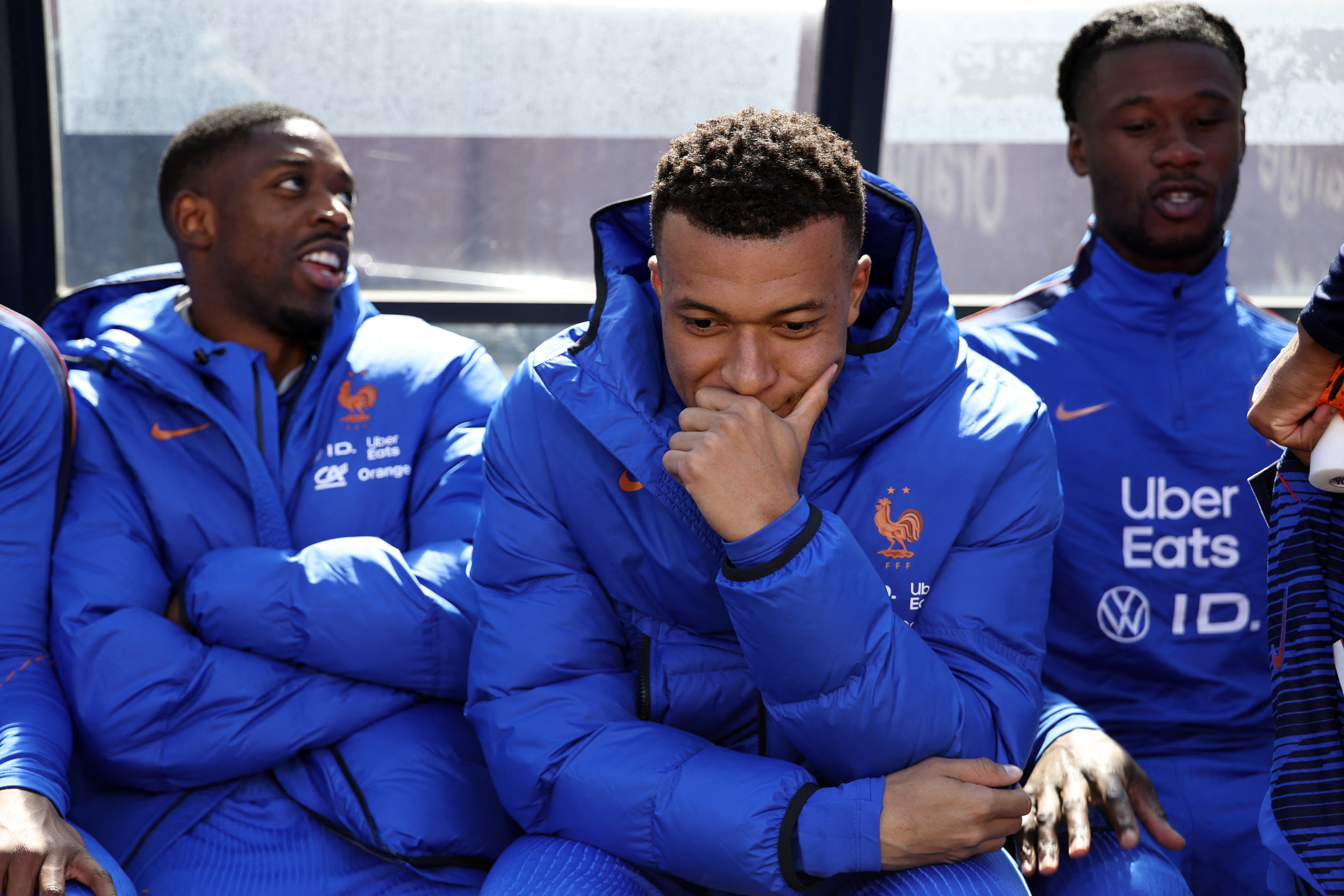 Kylian Mbappe and Ousmane Dembele react.