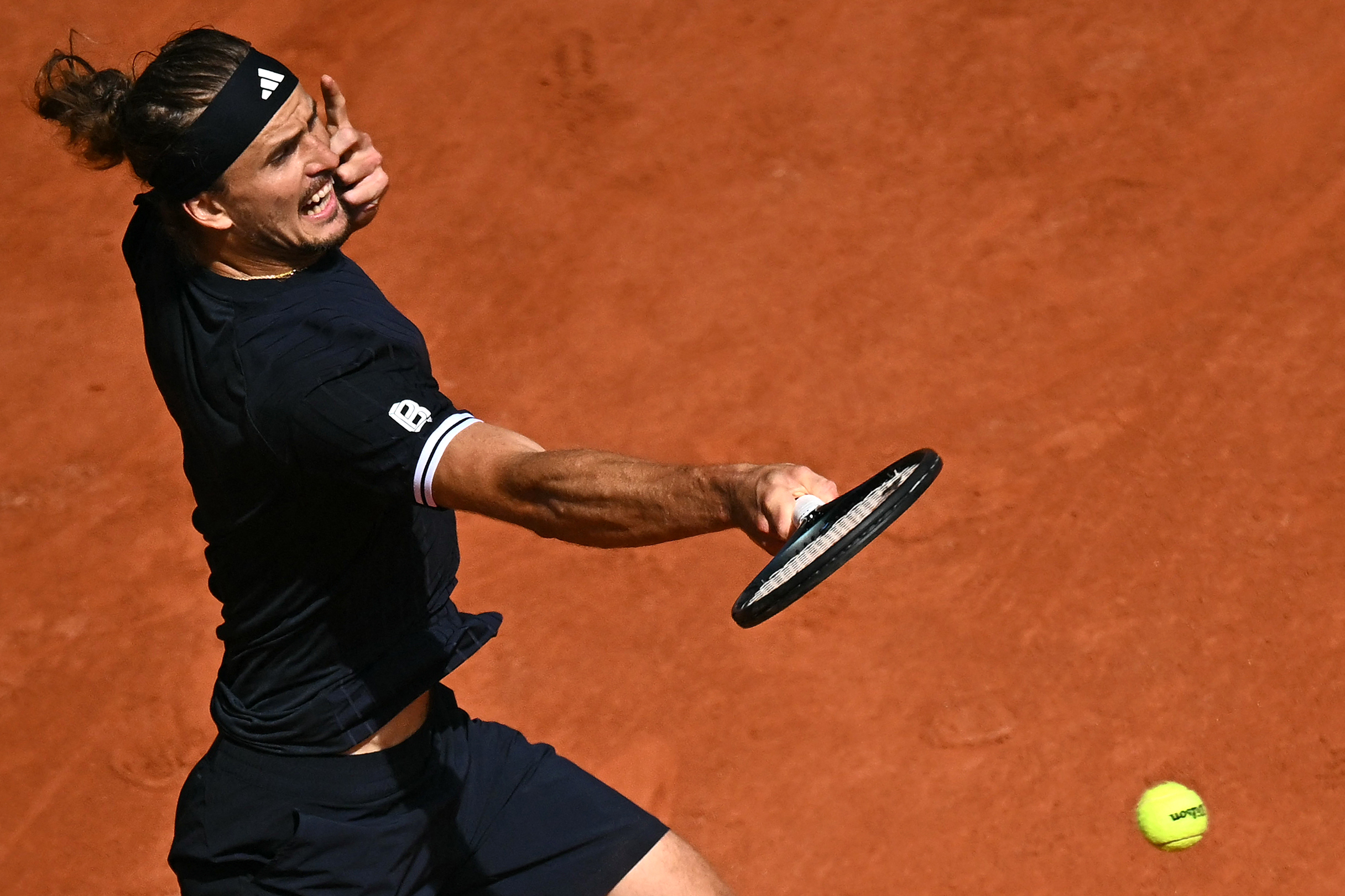 Alexander Zverev plays a forehand return to Italy’s Flavio Cobolli during the final