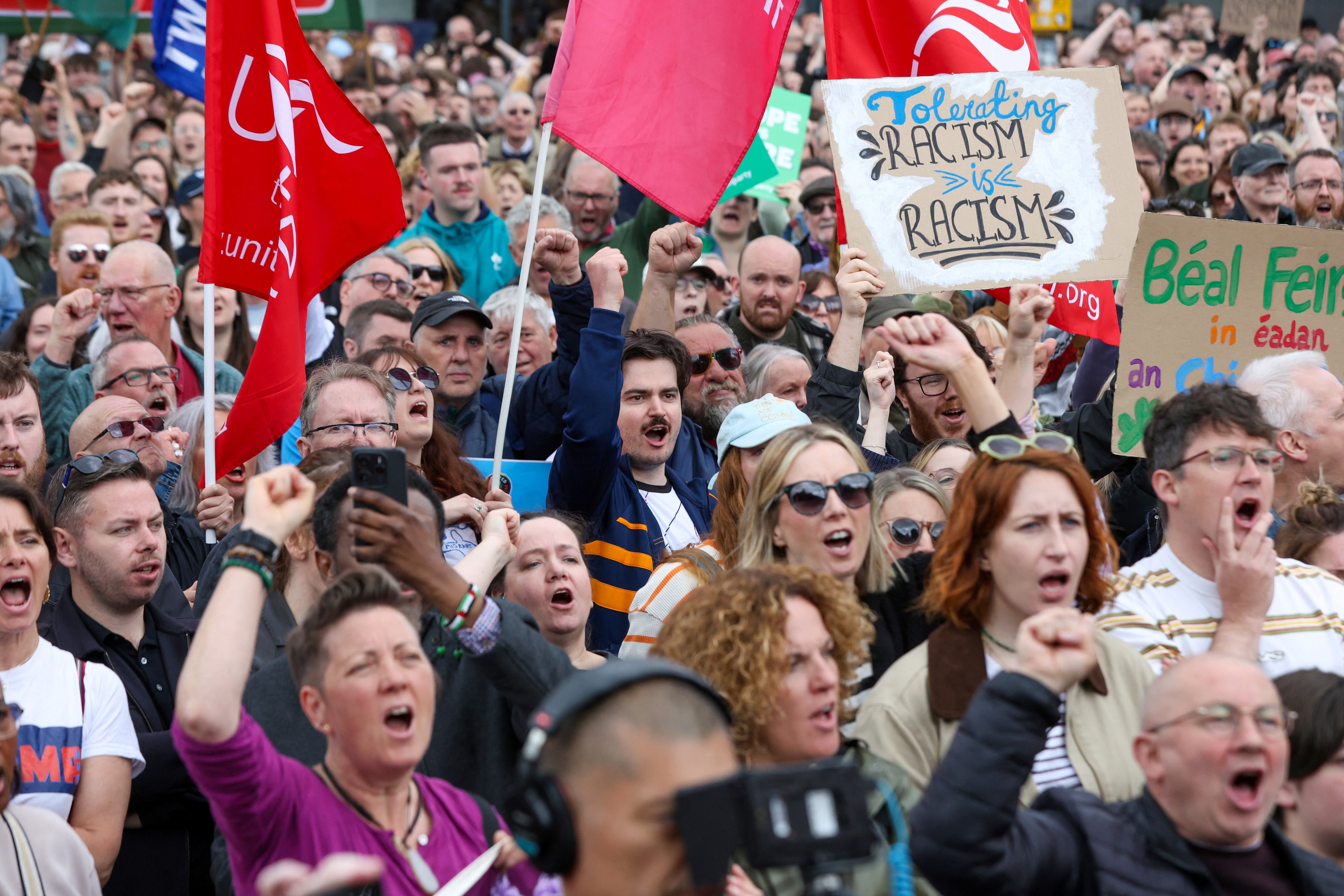 People turn out for a demonstration against racism and call for calm in central Belfast, Northern Ireland on June 13, 2026.
