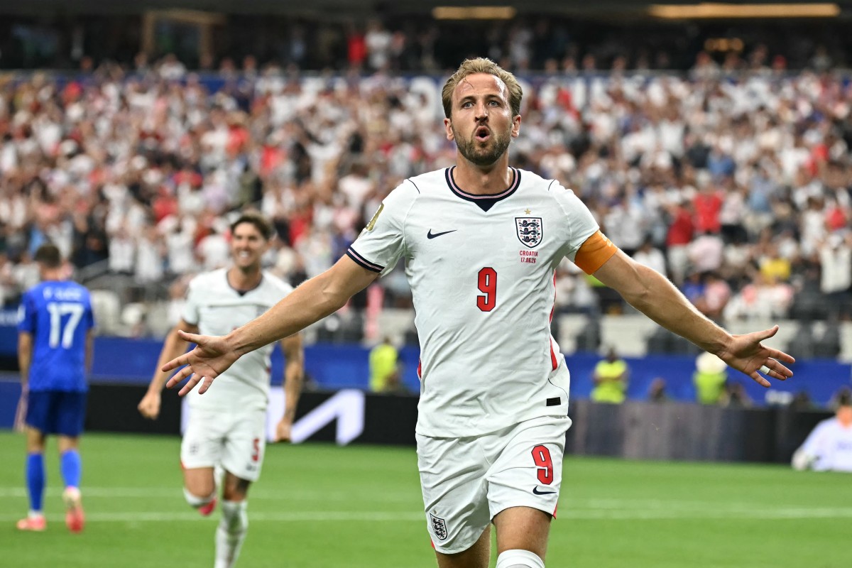 England's forward #09 Harry Kane celebrates after scoring his team's second goal during the 2026 World Cup game