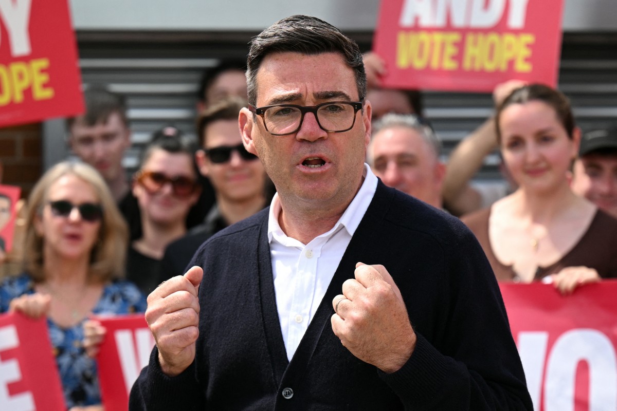 Labour candidate Andy Burnham addresses supporters in Ashton in Makerfield, northwest England, on June 18, 2026, the day of the by-election he won
