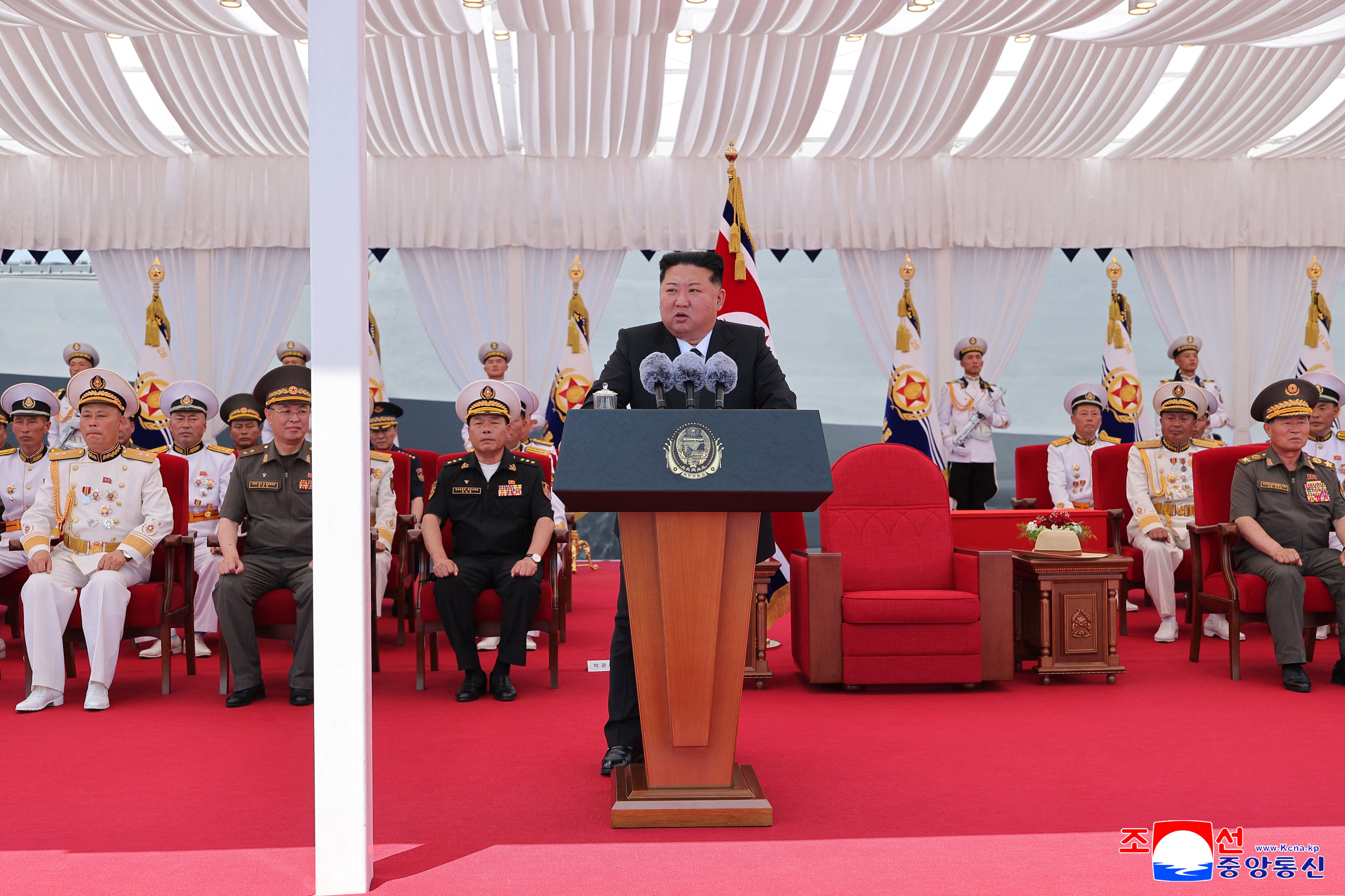 North Korea commissions warship as Kim eyes nuclear navy