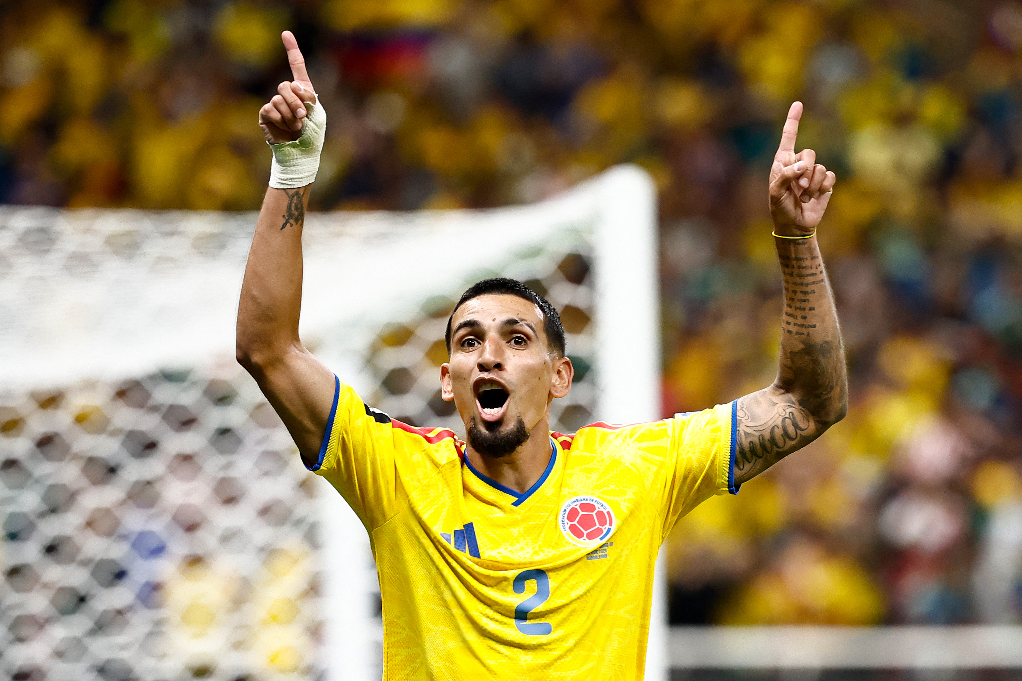 Colombia's defender #02 Daniel Munoz celebrates scoring his team's first goal during the 2026 World Cup Group K football match between Colombia and Democratic Republic of Congo at the Guadalajara Stadium in Zapopan on June 23, 2026. (Photo by Ulises RUIZ / AFP)