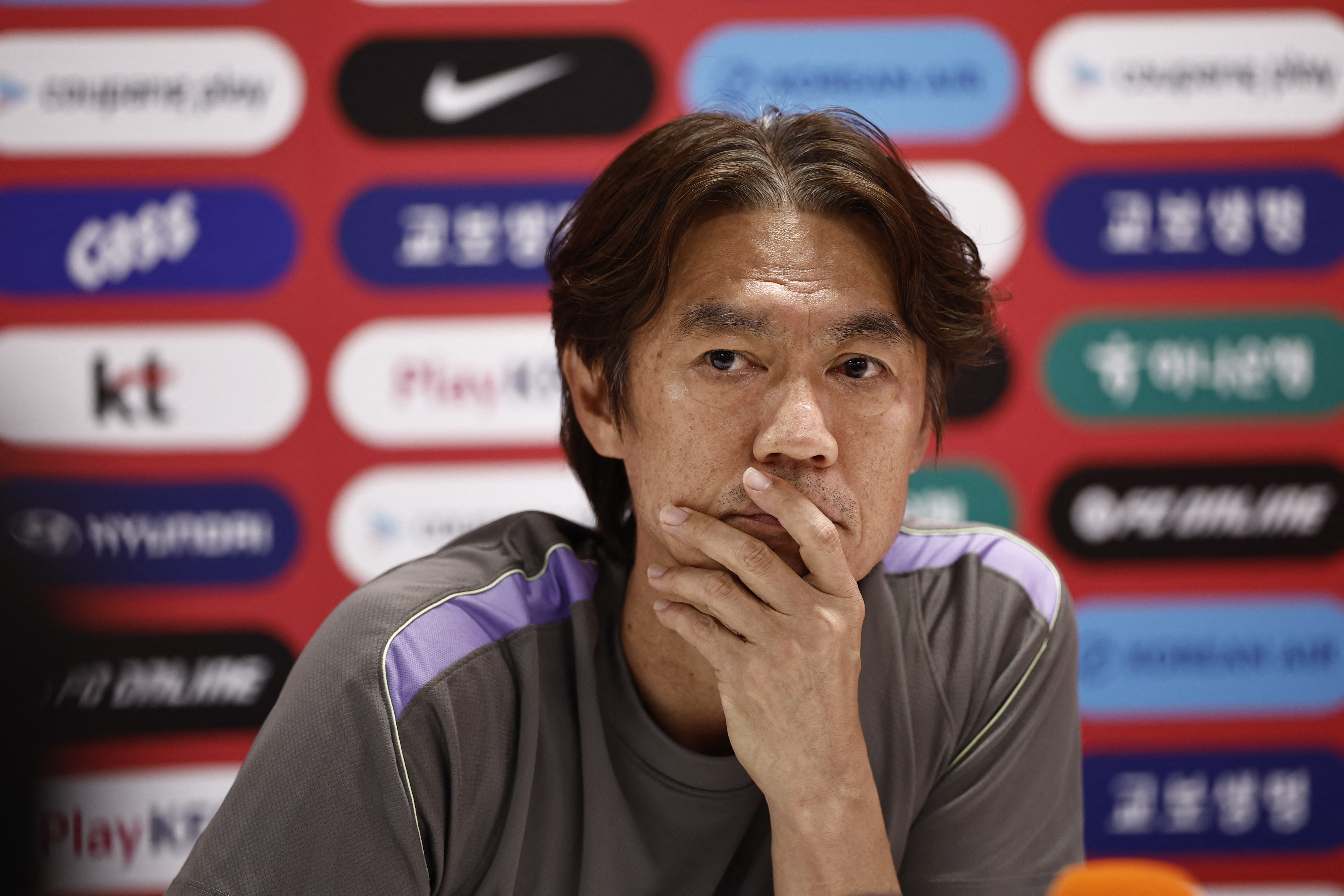 South Korea's head coach Hong Myung-bo gestures as he gives a press conference at Chivas Verde Valle in Guadalajara, Mexico on June 25, 2026, during the 2026 World Cup football tournament. (Photo by Ulises RUIZ / AFP)