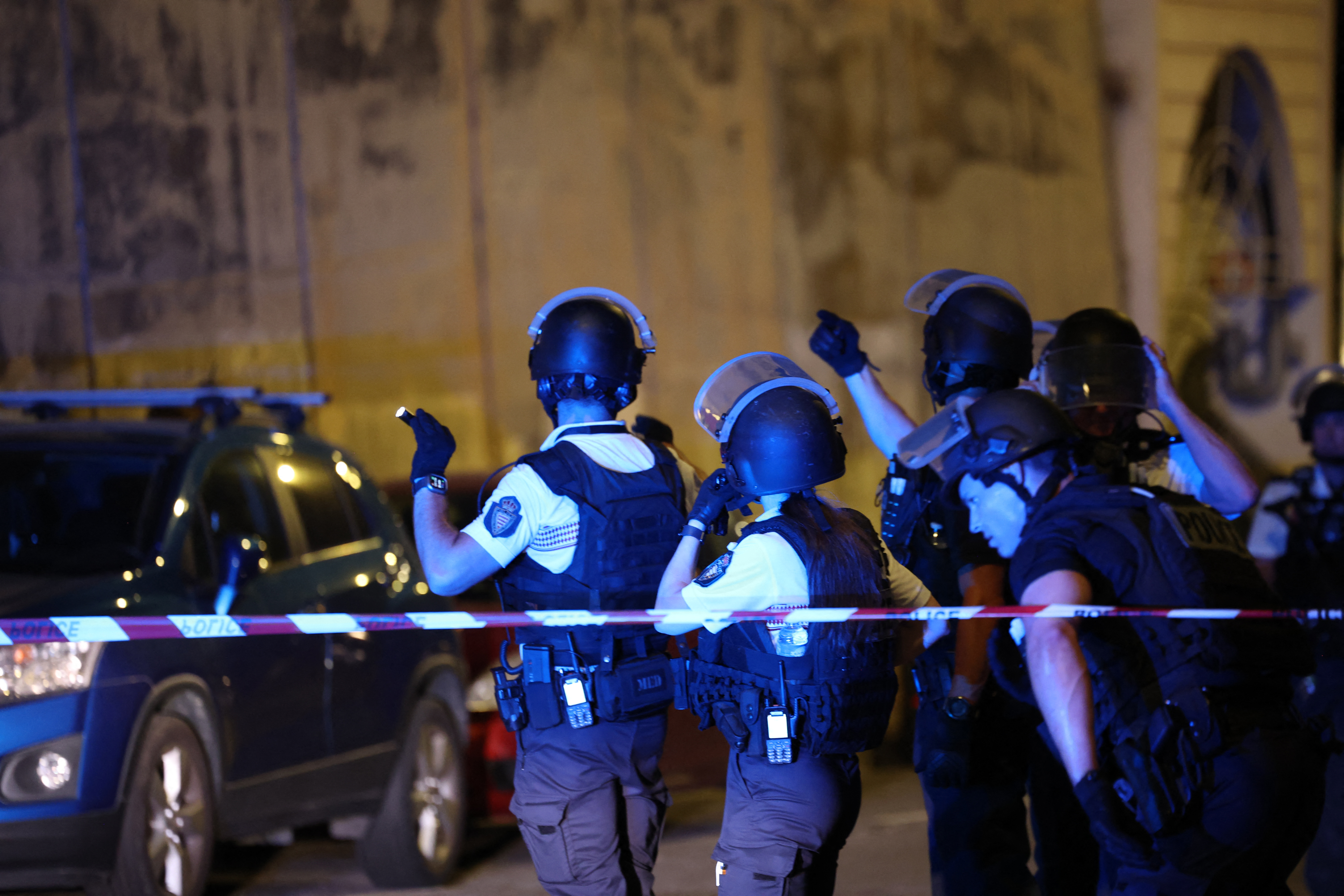 Monaco police officers patrol near the site of an explosion in a residential building in Monaco, near the French border, on June 29, 2026. A Ukrainian oligarch, Vadim Ermolaev, was injured along with two other people, in the explosion of an explosive device in Monaco in the evening, a source close to the investigation told AFP. The blast at a residential building was "very likely an attack", Monaco's Minister of State (head of government) said. Public prosecutor said a suspect had left a bag or package in the building's lobby before leaving. Two adults, including Mr. Ermolaev, are in critical condition, and a 13-year-old adolescent sustained less serious injuries. (Photo by Valery HACHE / AFP)
