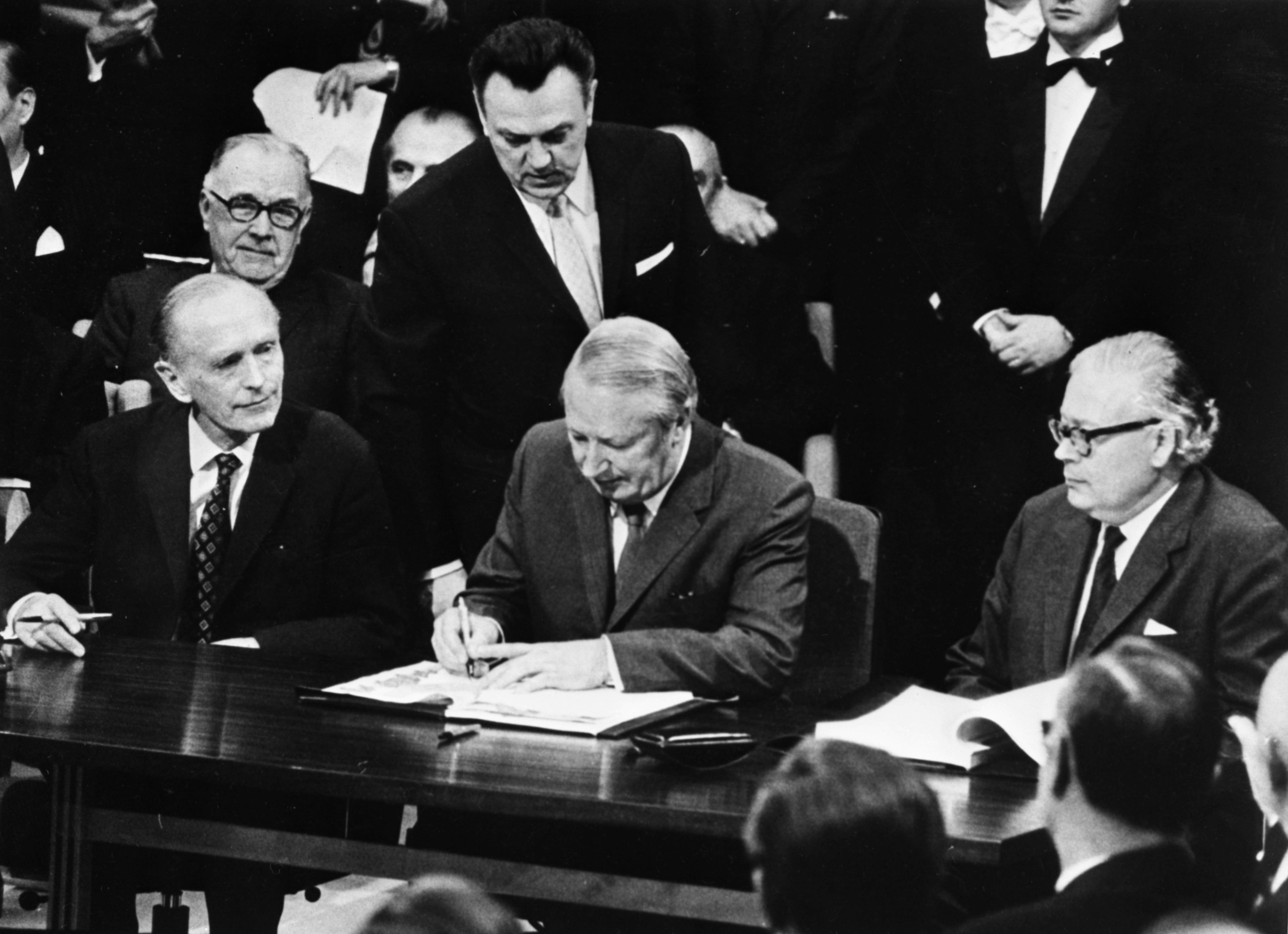 In this January 22, 1972, file photo, British Prime Minister Edward Heath, centre, signs the treaty for Britain to join the European Economic Community at the Palais d’Egmont in Brussels, Belgium. Britain’s membership was a drawn-out affair after French President Charles de Gaulle twice vetoed the country’s application [AP]