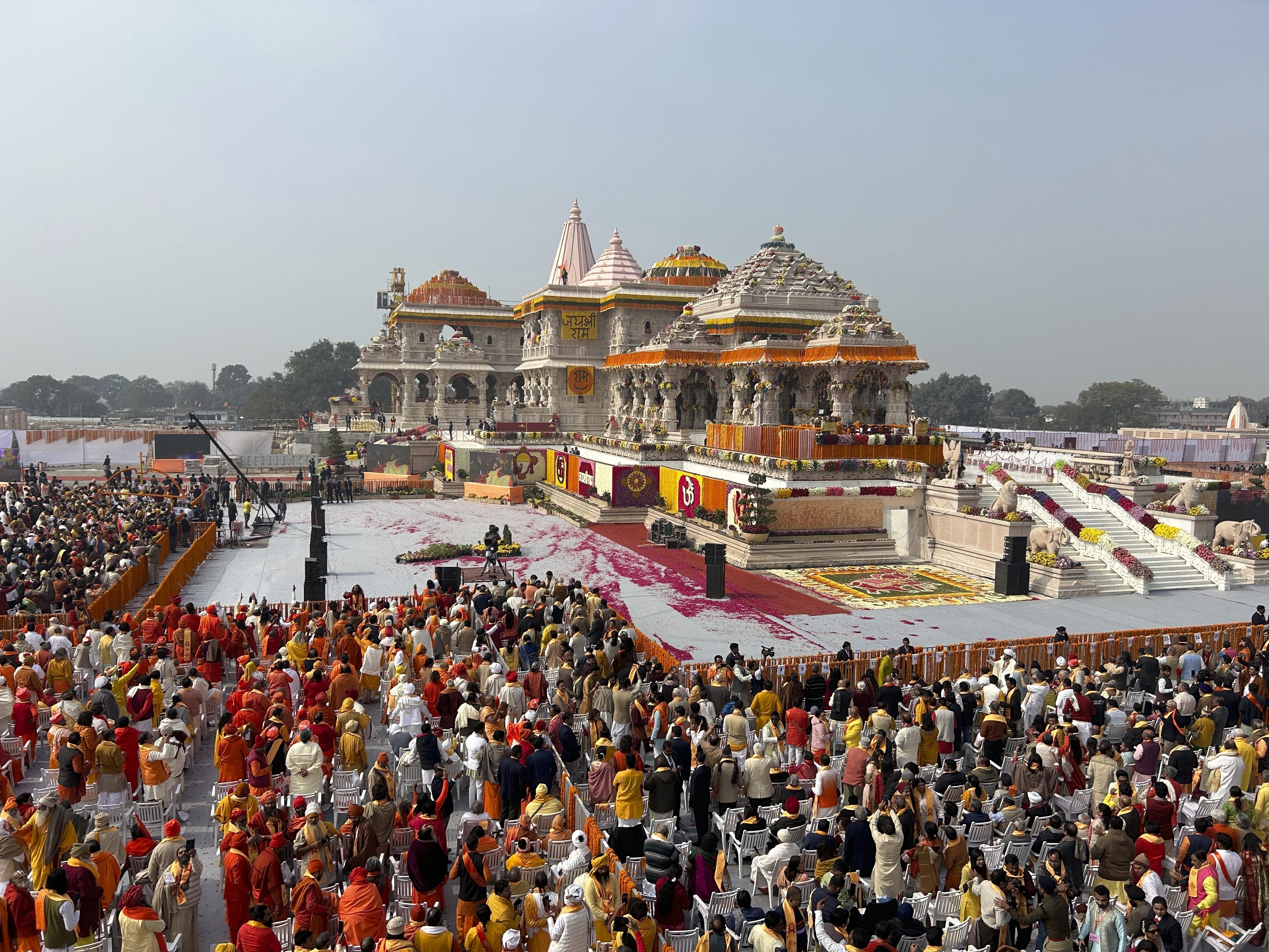 A general view of the audience during the opening of a temple dedicated to Hindu deity Lord Ram, in Ayodhya, India