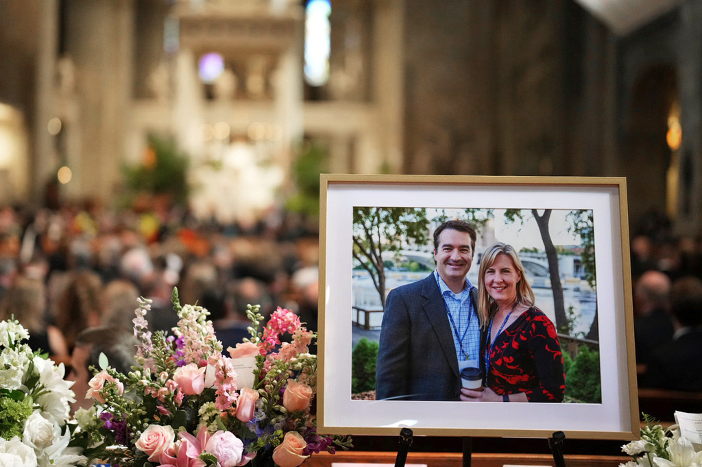 a photo of Mark and Melissa Hortman at a memorial